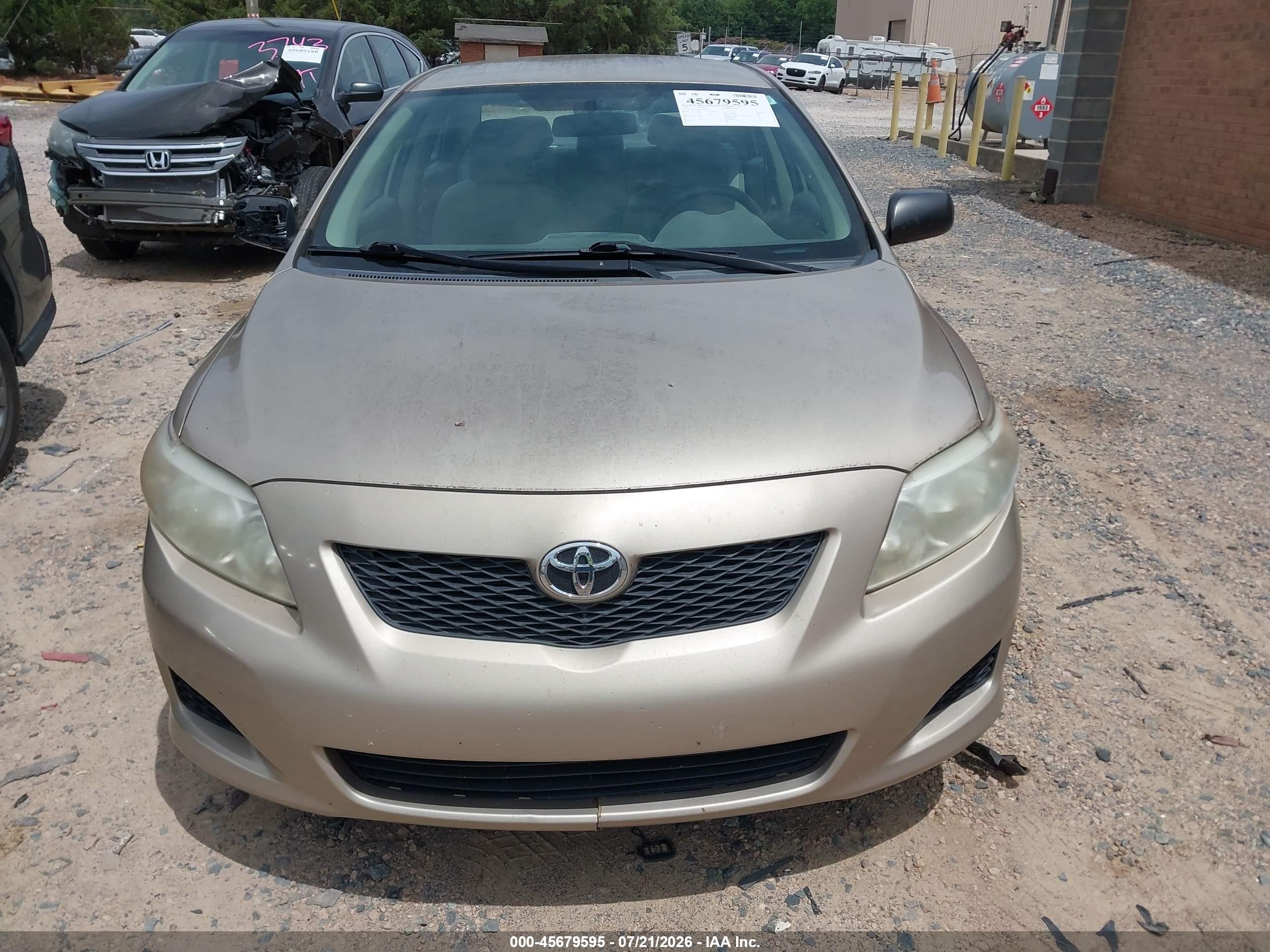 2010 Toyota Corolla Tan vin: 2T1BU4EE4AC314654