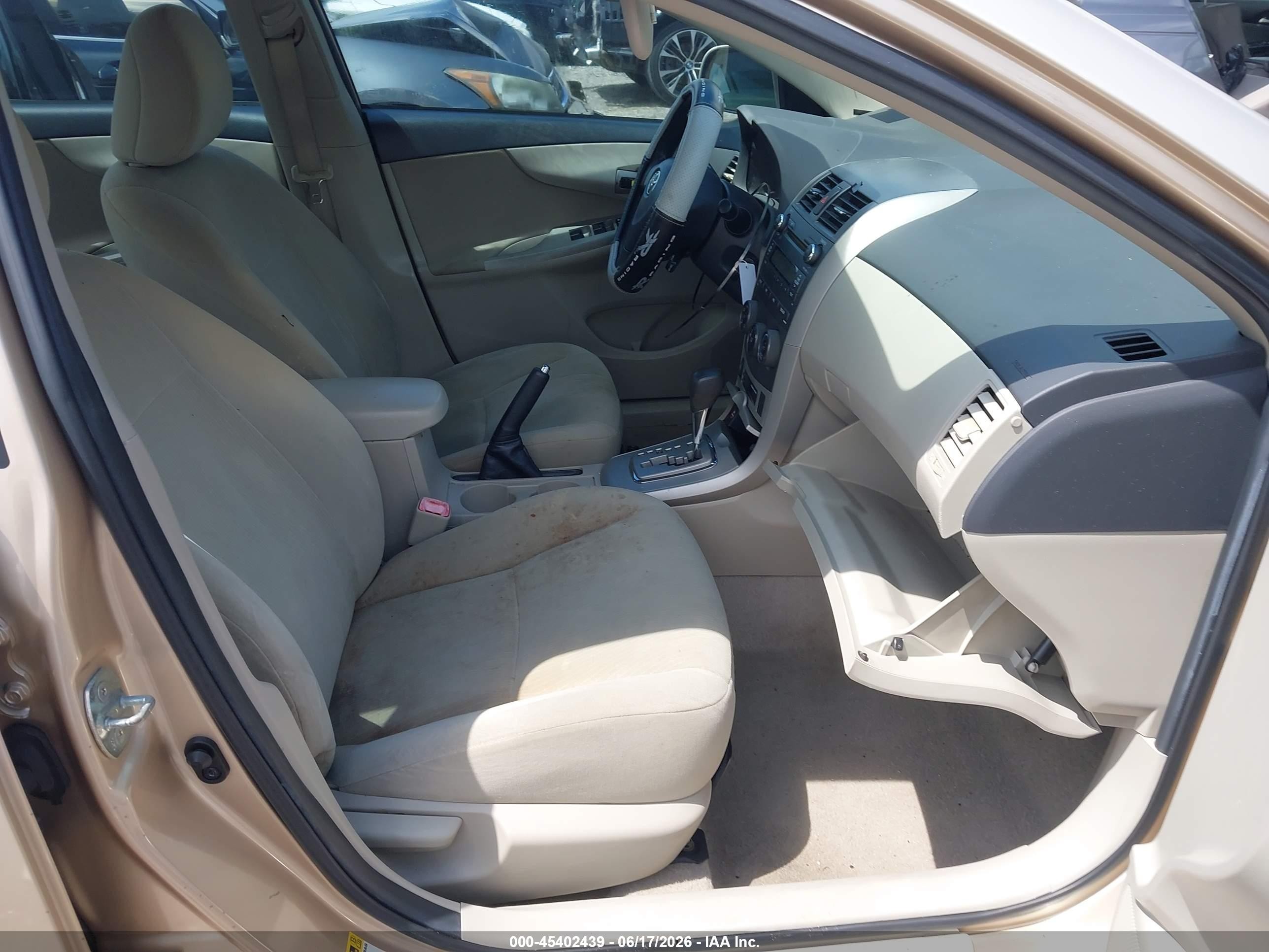 2011 Toyota Corolla Le Gold vin: 2T1BU4EE4BC571038