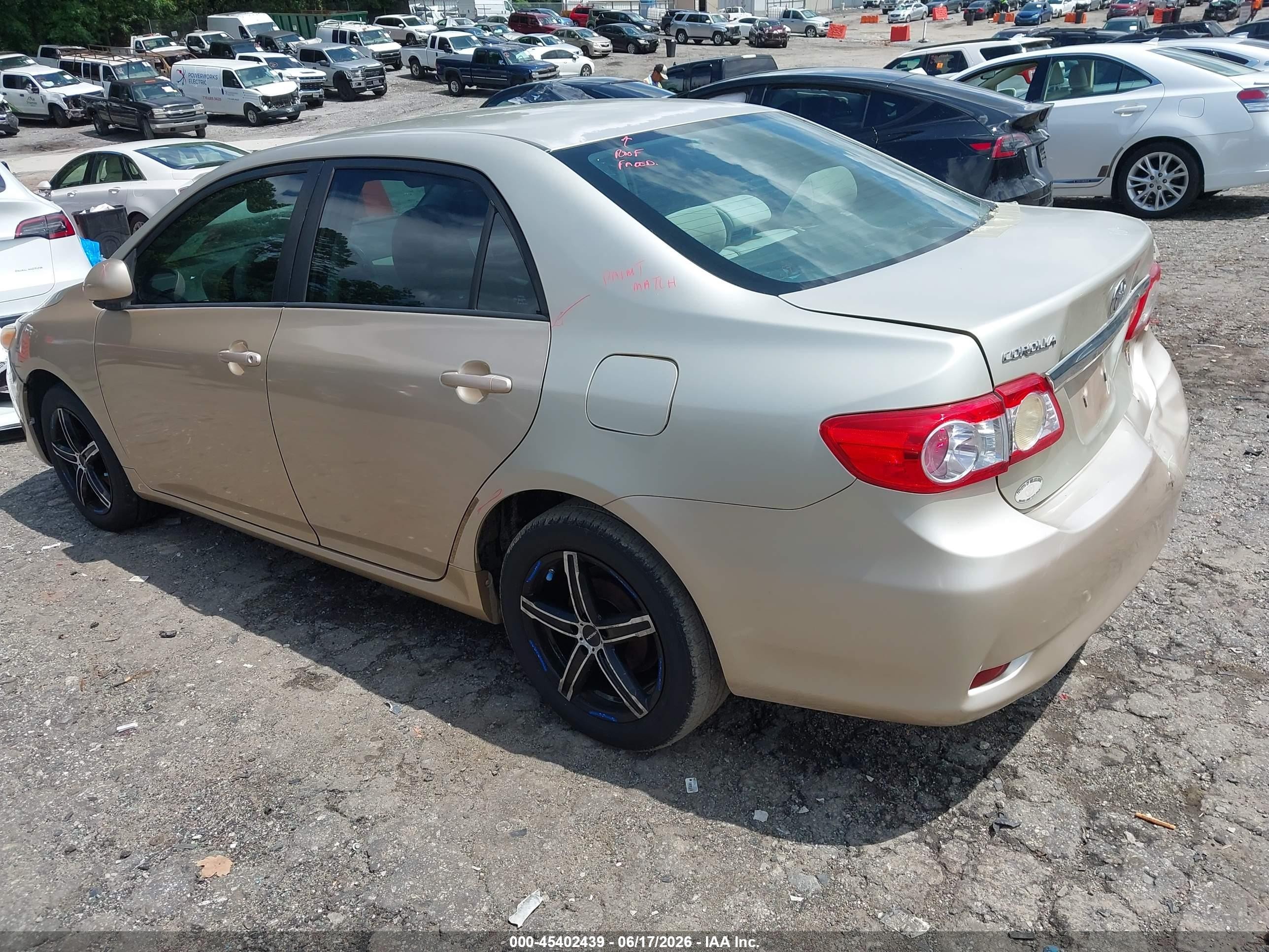 2011 Toyota Corolla Le Gold vin: 2T1BU4EE4BC571038