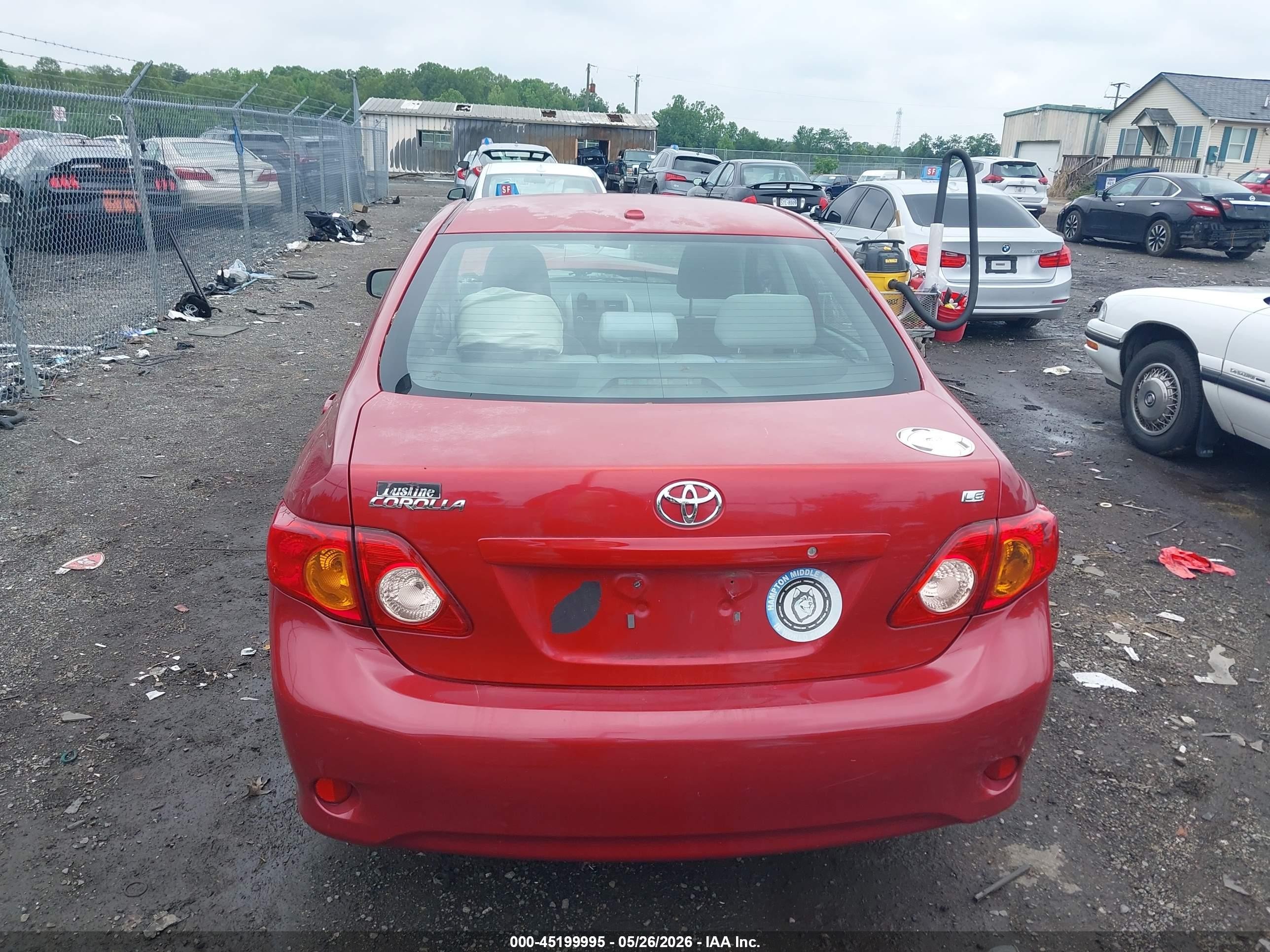 2010 Toyota Corolla Le Red vin: 2T1BU4EE5AC247109