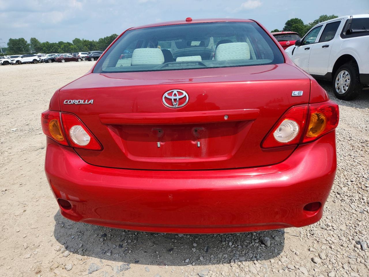 2010 Toyota Corolla Le Red vin: 2T1BU4EE5AC321063