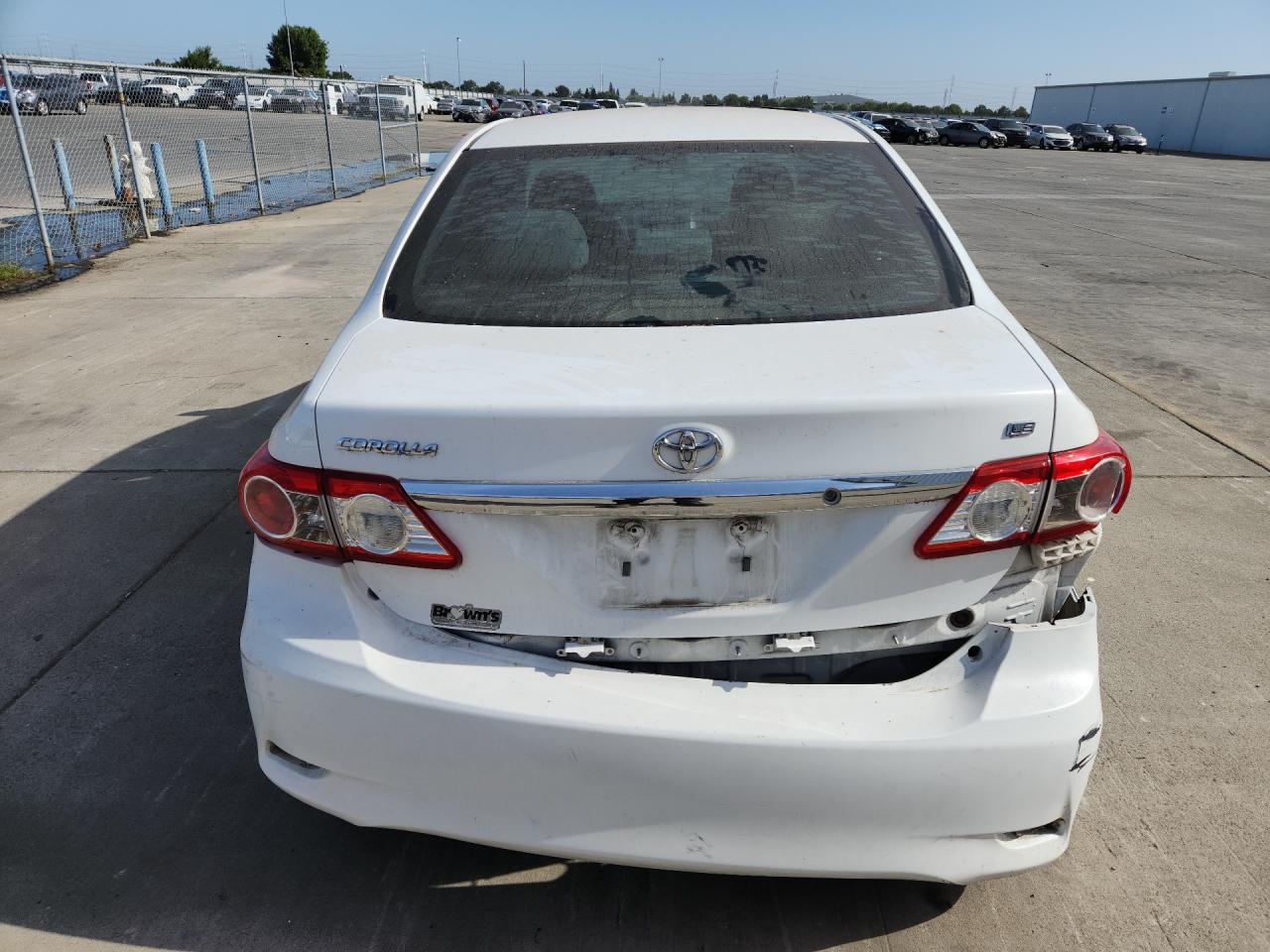 2011 Toyota Corolla Le White vin: 2T1BU4EE5BC673559 Damage: Deck Lid, Dent(S) W/ Paint Dmg, 1 To 2 Inches