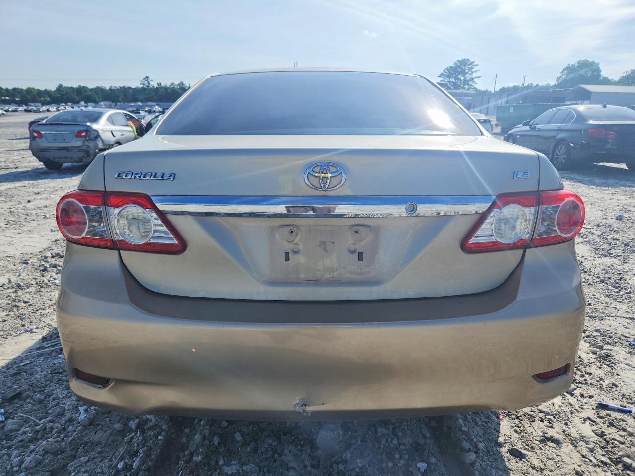 2012 Toyota Corolla Le Gold vin: 2T1BU4EE5CC885752