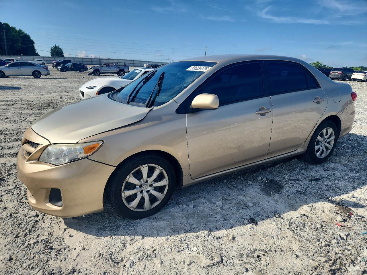 2012 Toyota Corolla Le Gold vin: 2T1BU4EE5CC885752