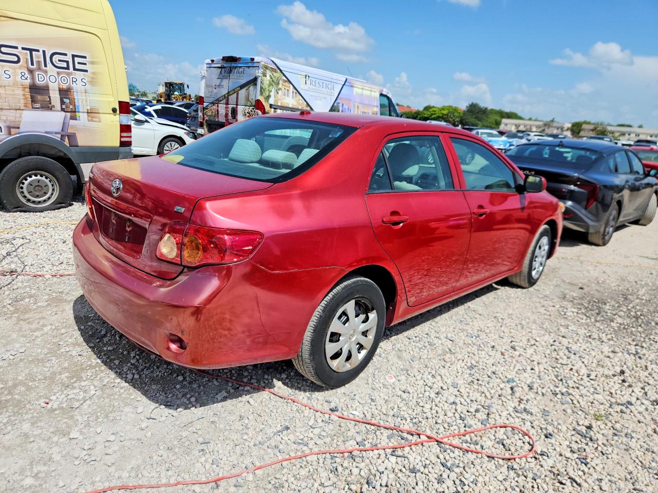 2010 Toyota Corolla Le Red vin: 2T1BU4EE6AC503788