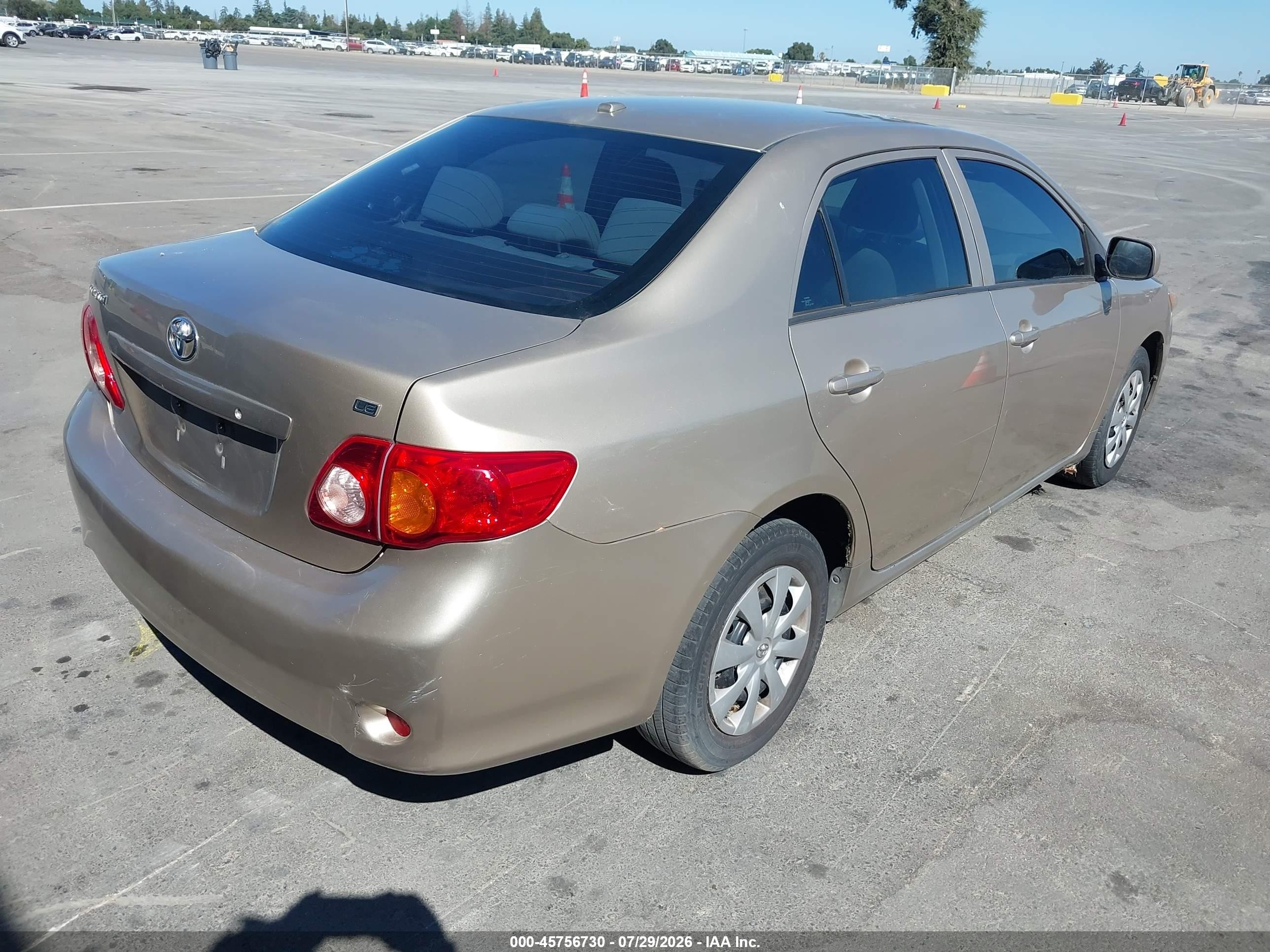 2010 Toyota Corolla Le Gold vin: 2T1BU4EE6AC504035