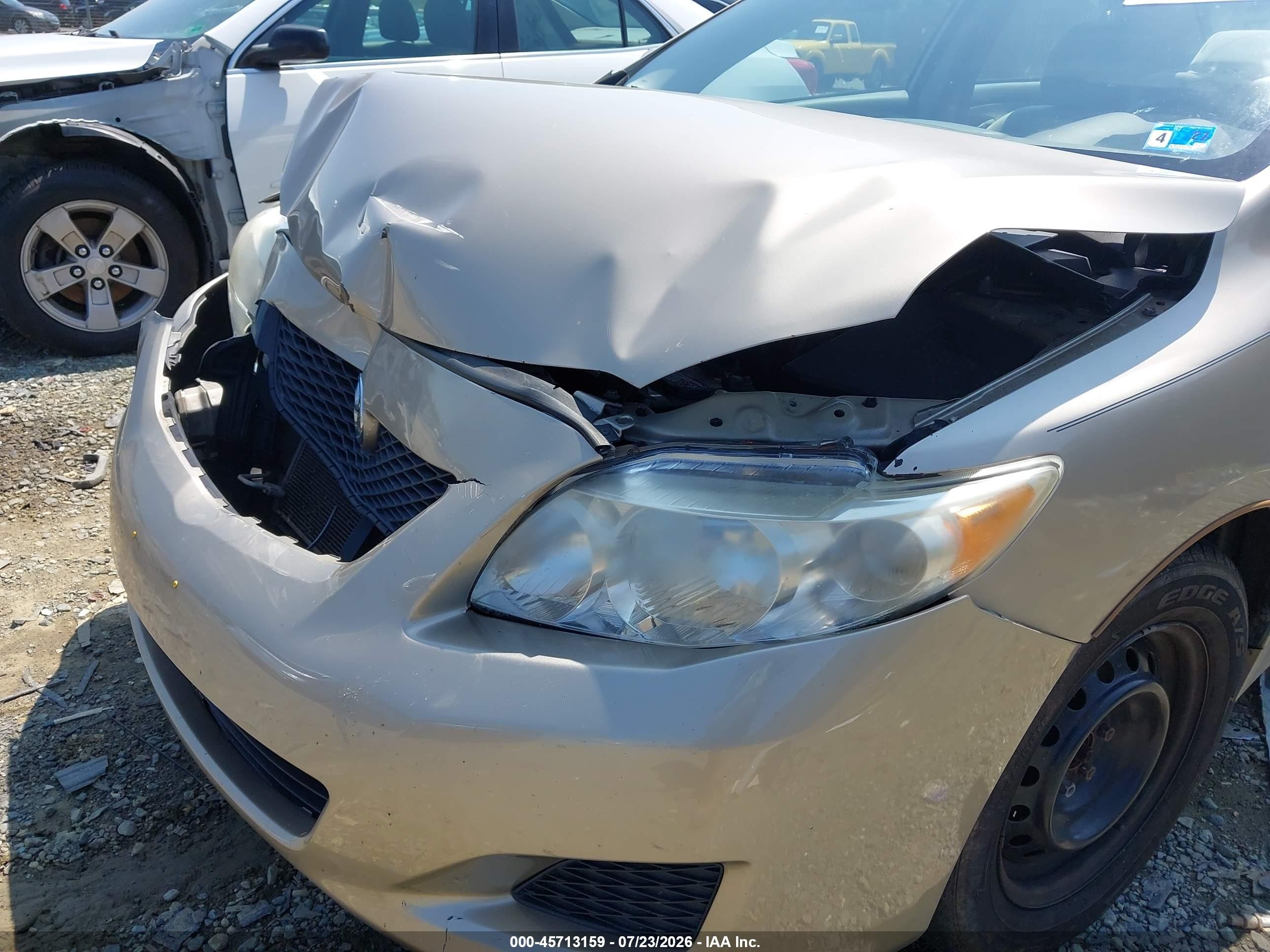 2010 Toyota Corolla Le Gold vin: 2T1BU4EE7AC229341