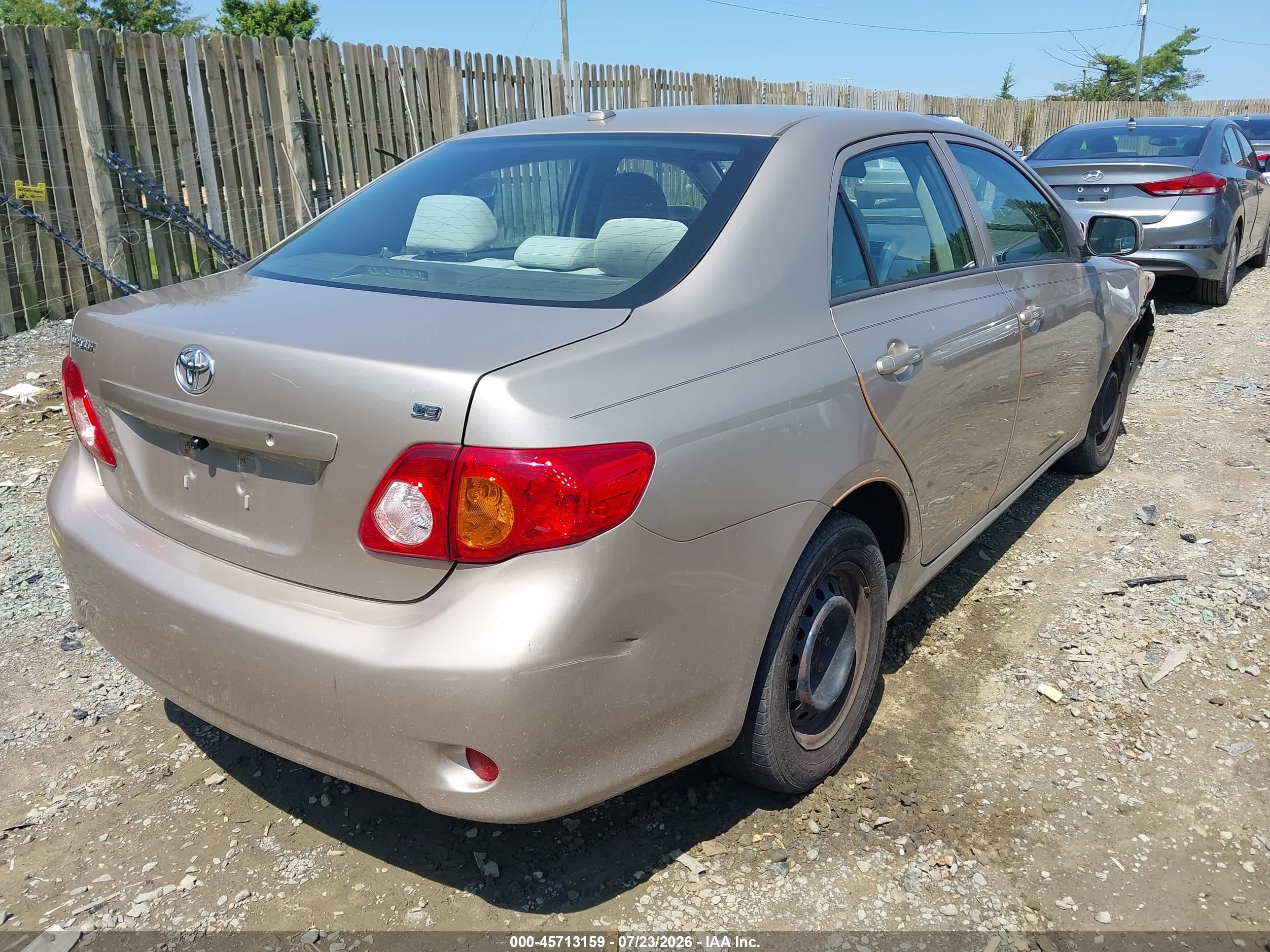 2010 Toyota Corolla Le Gold vin: 2T1BU4EE7AC229341