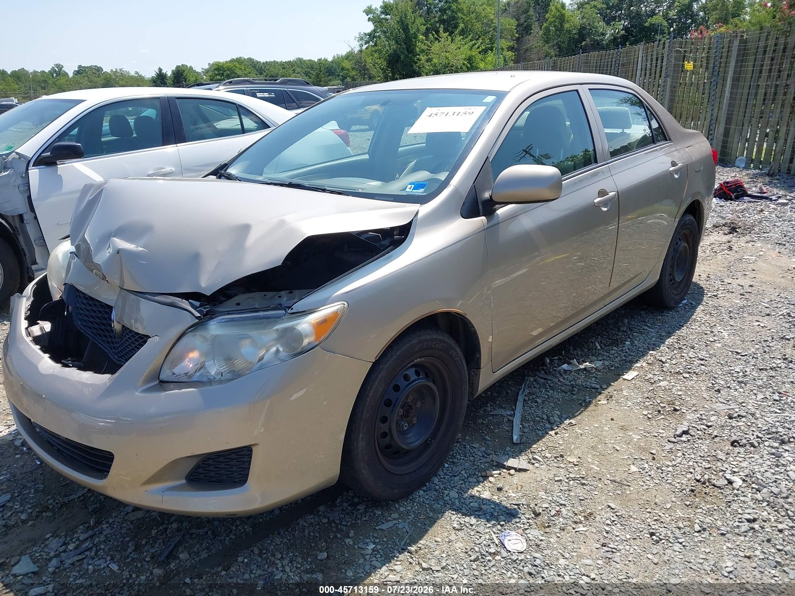 2010 Toyota Corolla Le Gold vin: 2T1BU4EE7AC229341