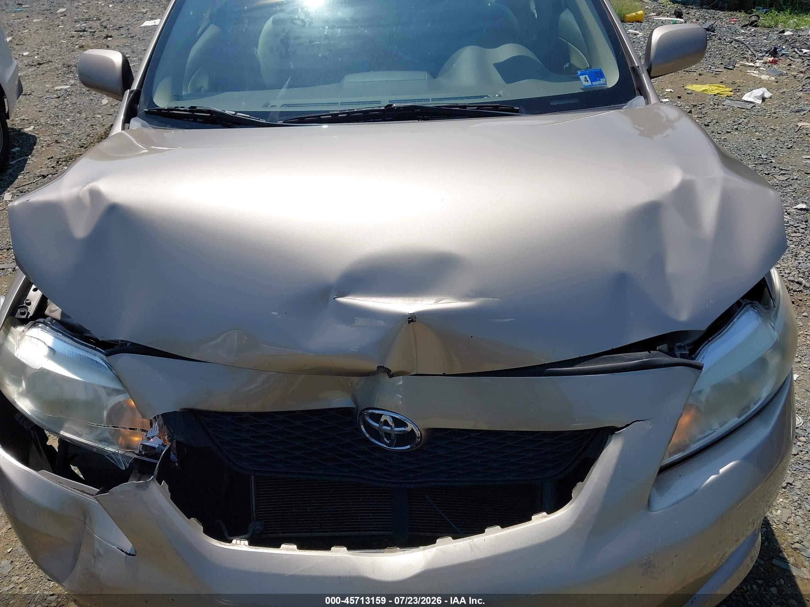 2010 Toyota Corolla Le Gold vin: 2T1BU4EE7AC229341