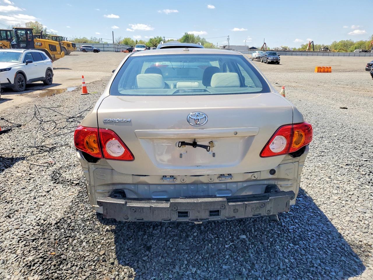 2010 Toyota Corolla Base Tan vin: 2T1BU4EE7AC231087