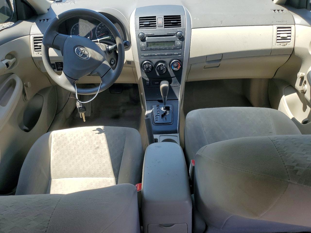 2010 Toyota Corolla Base Tan vin: 2T1BU4EE7AC231087