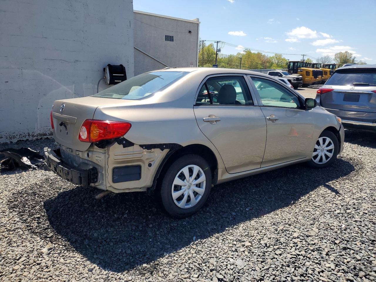 2010 Toyota Corolla Base Tan vin: 2T1BU4EE7AC231087