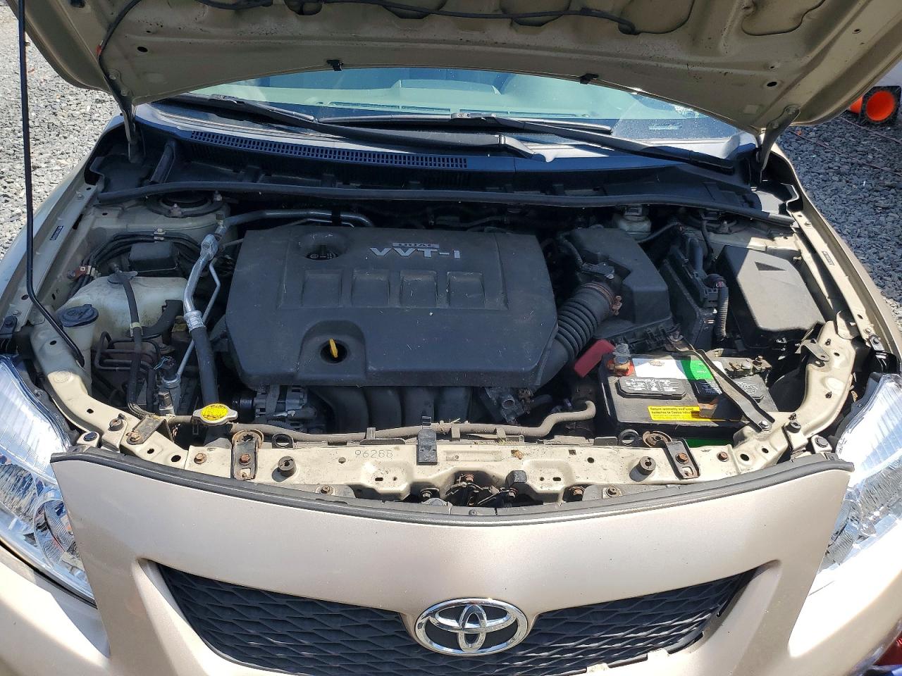 2010 Toyota Corolla Base Tan vin: 2T1BU4EE7AC231087