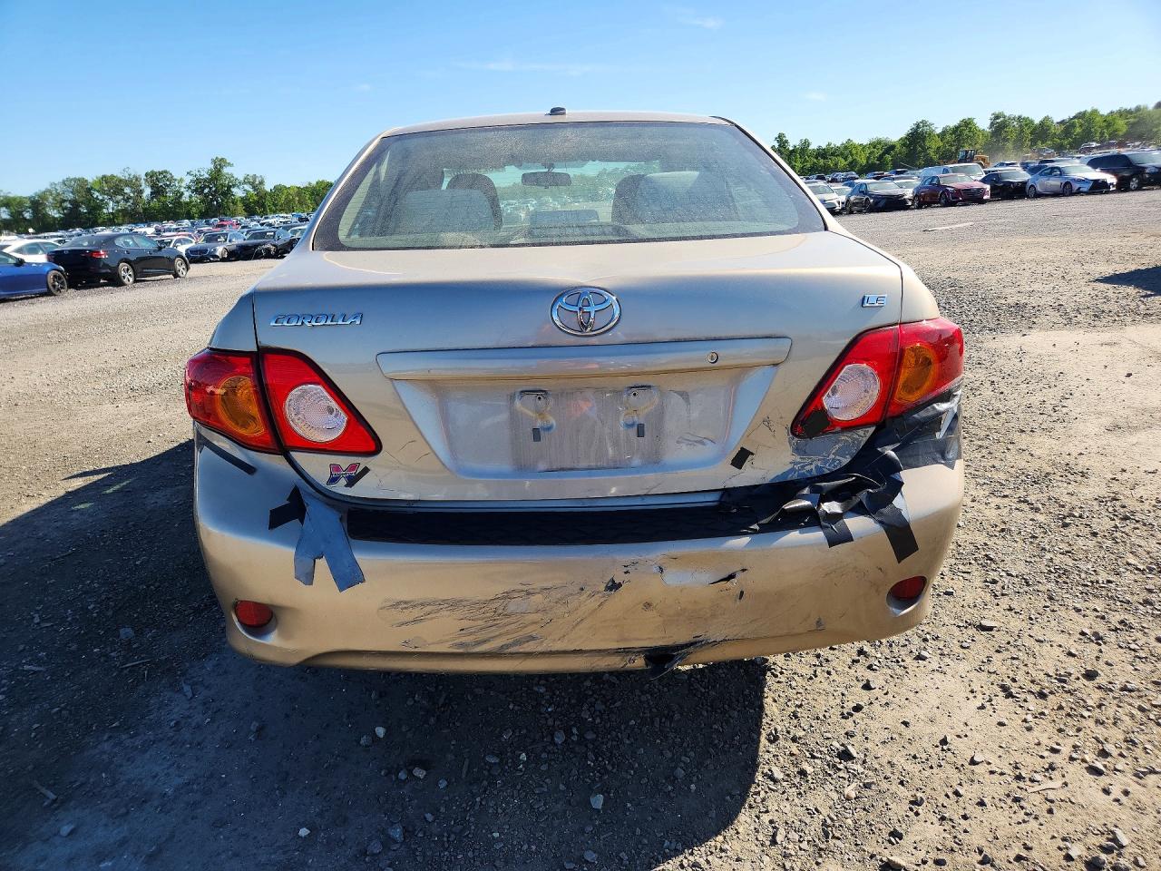 2010 Toyota Corolla Le Tan vin: 2T1BU4EE7AC301512