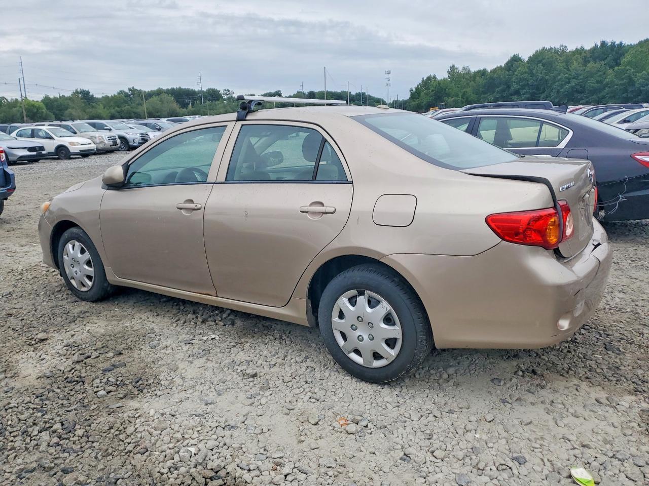2010 Toyota Corolla Le Tan vin: 2T1BU4EE7AC323235