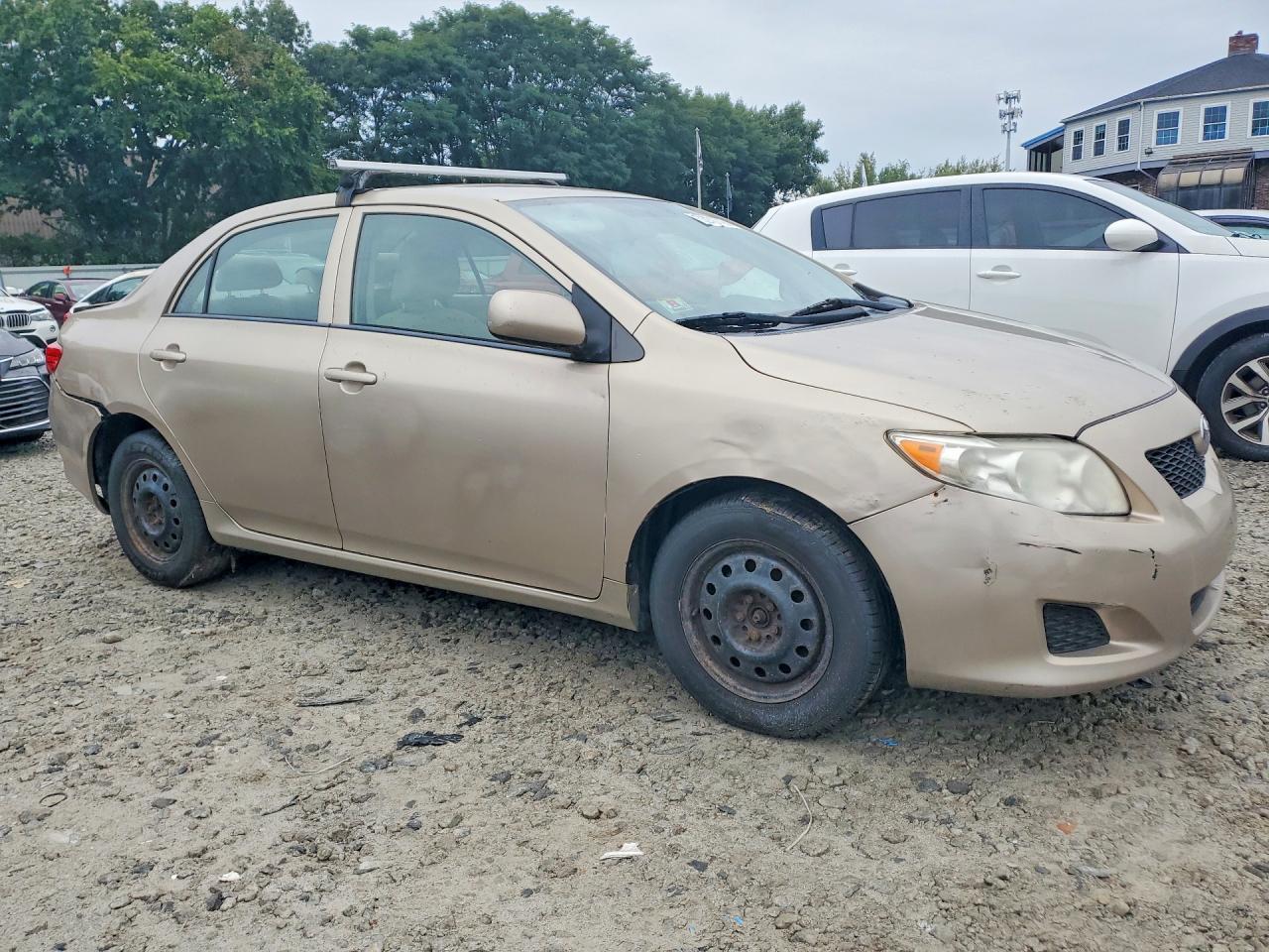 2010 Toyota Corolla Le Tan vin: 2T1BU4EE7AC323235