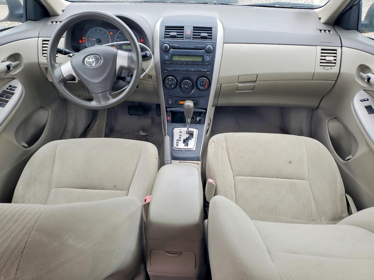 2010 Toyota Corolla Le Tan vin: 2T1BU4EE7AC323235