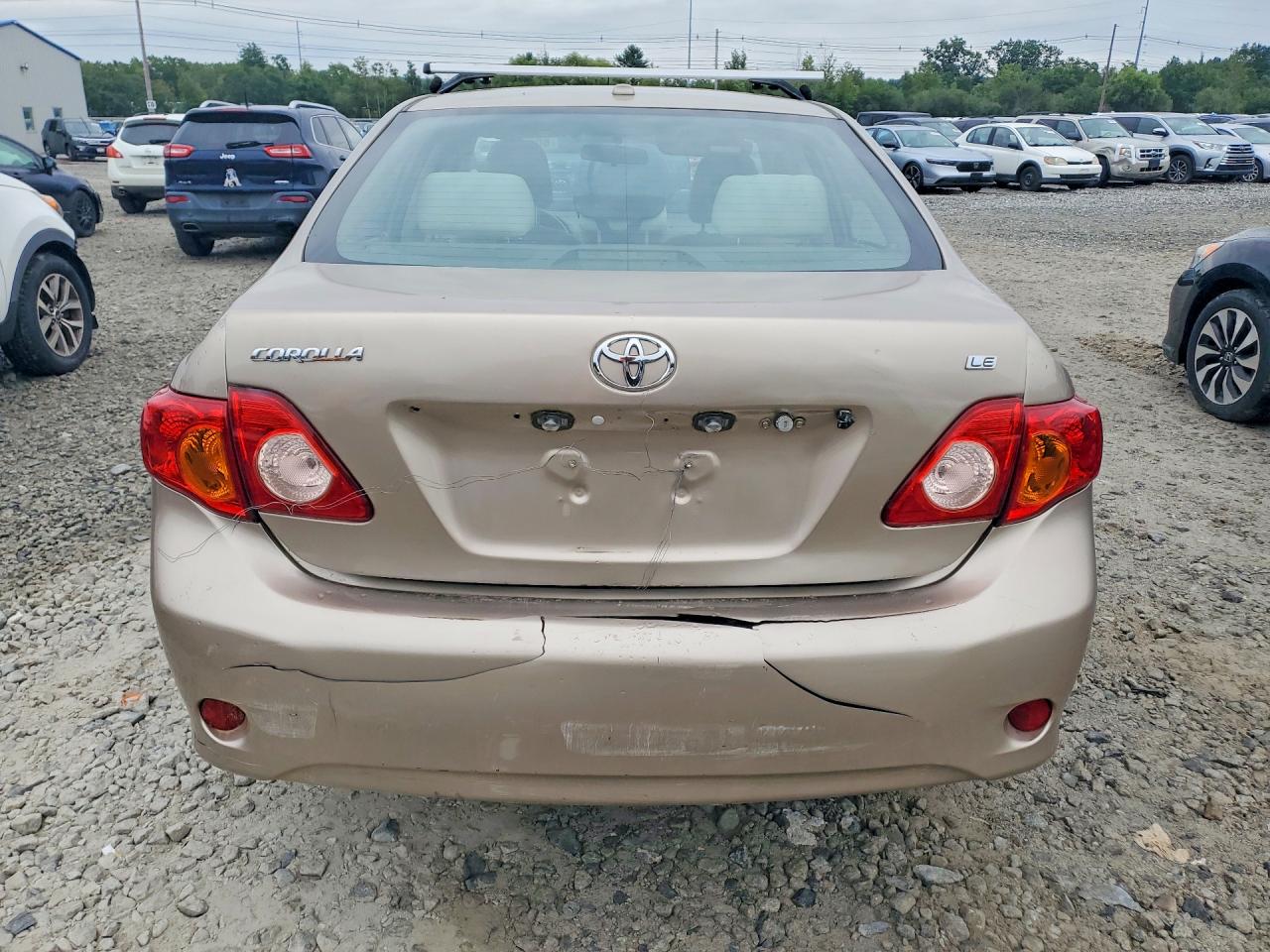 2010 Toyota Corolla Le Tan vin: 2T1BU4EE7AC323235