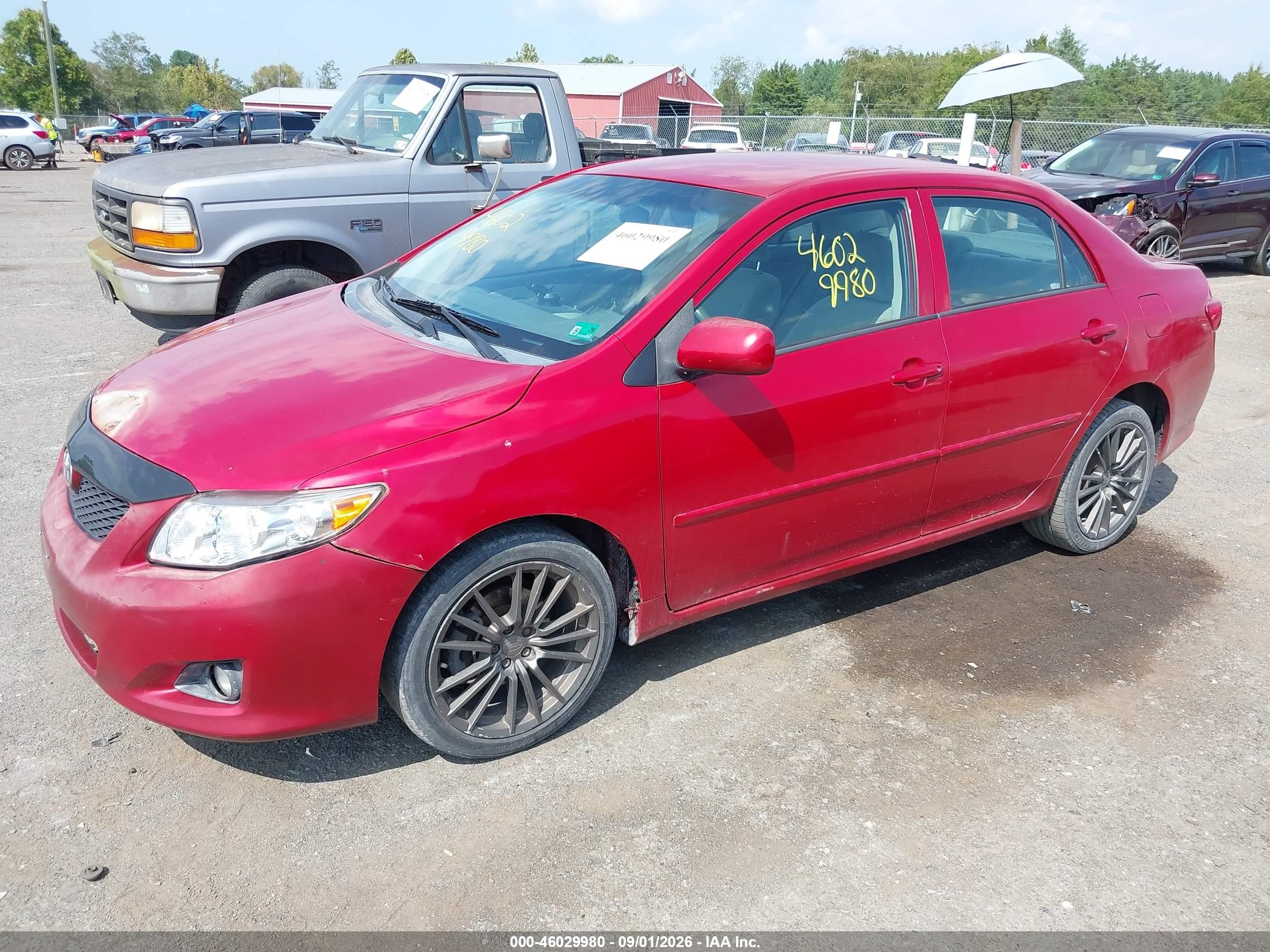2010 Toyota Corolla Le Red vin: 2T1BU4EE7AC334669