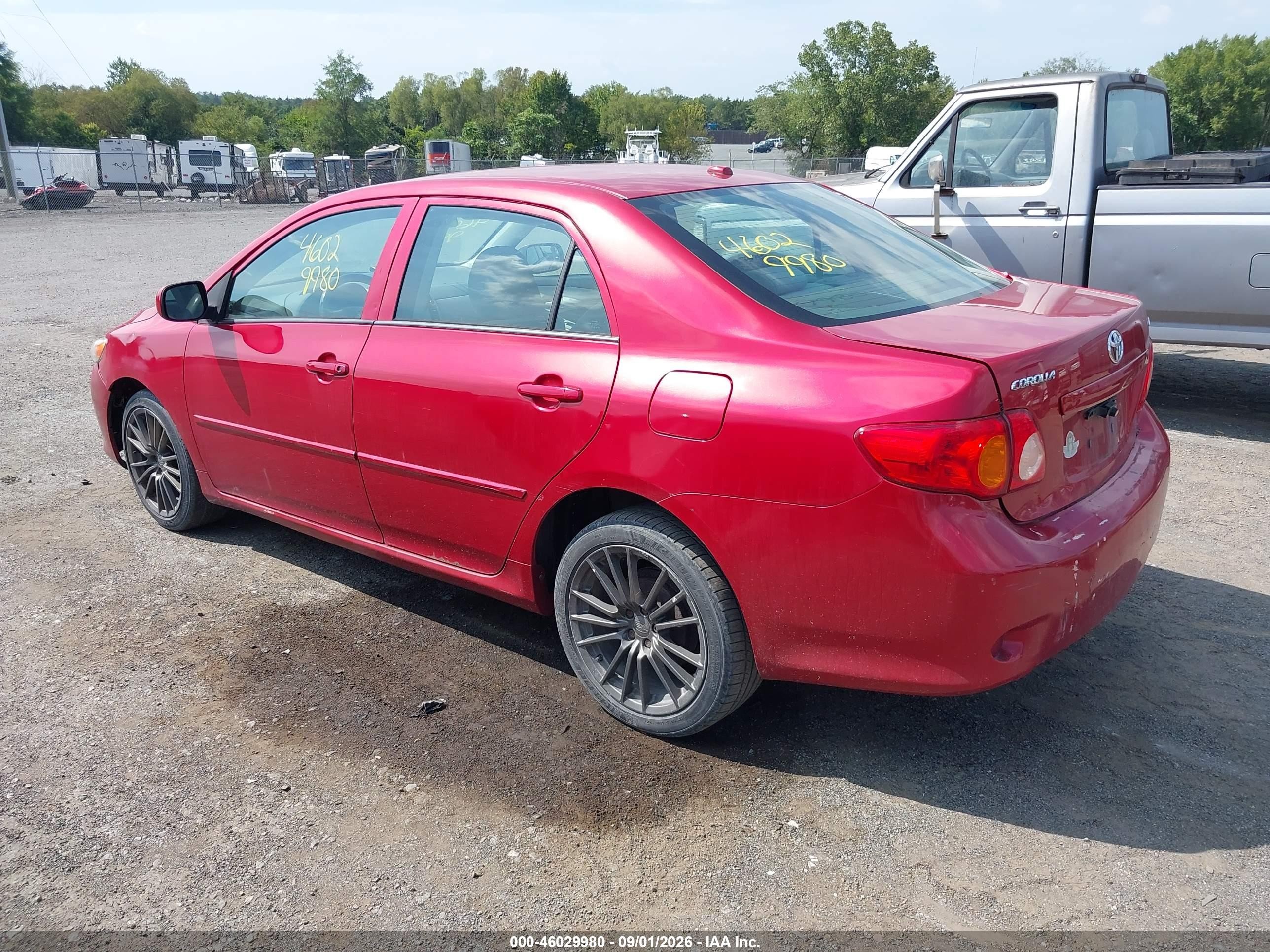 2010 Toyota Corolla Le Red vin: 2T1BU4EE7AC334669