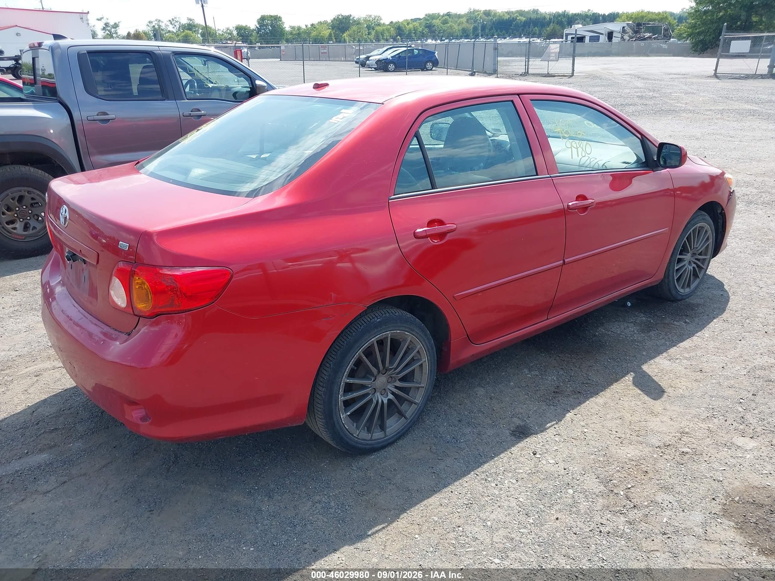 2010 Toyota Corolla Le Red vin: 2T1BU4EE7AC334669