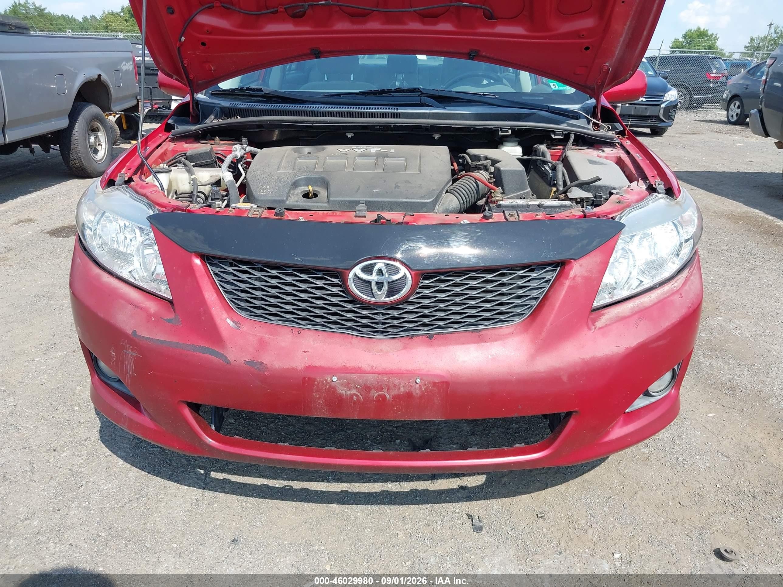 2010 Toyota Corolla Le Red vin: 2T1BU4EE7AC334669