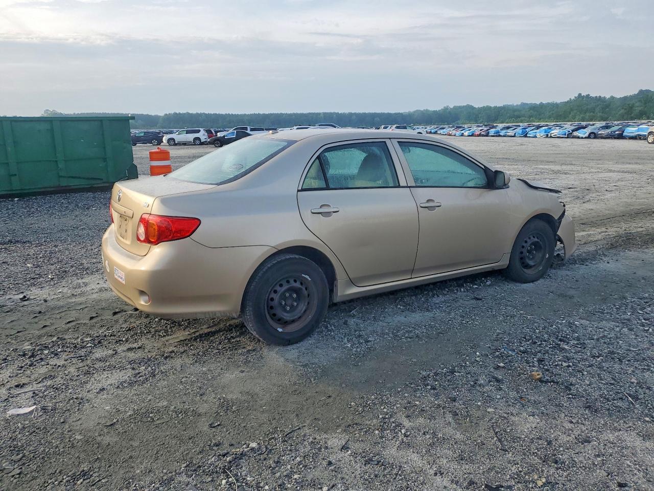 2010 Toyota Corolla Le Gold vin: 2T1BU4EE7AC509728
