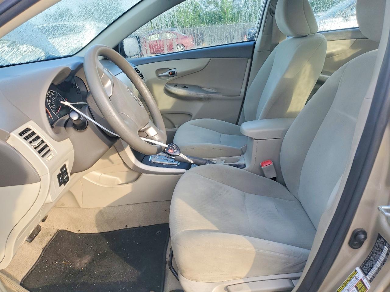 2010 Toyota Corolla Le Gold vin: 2T1BU4EE7AC509728