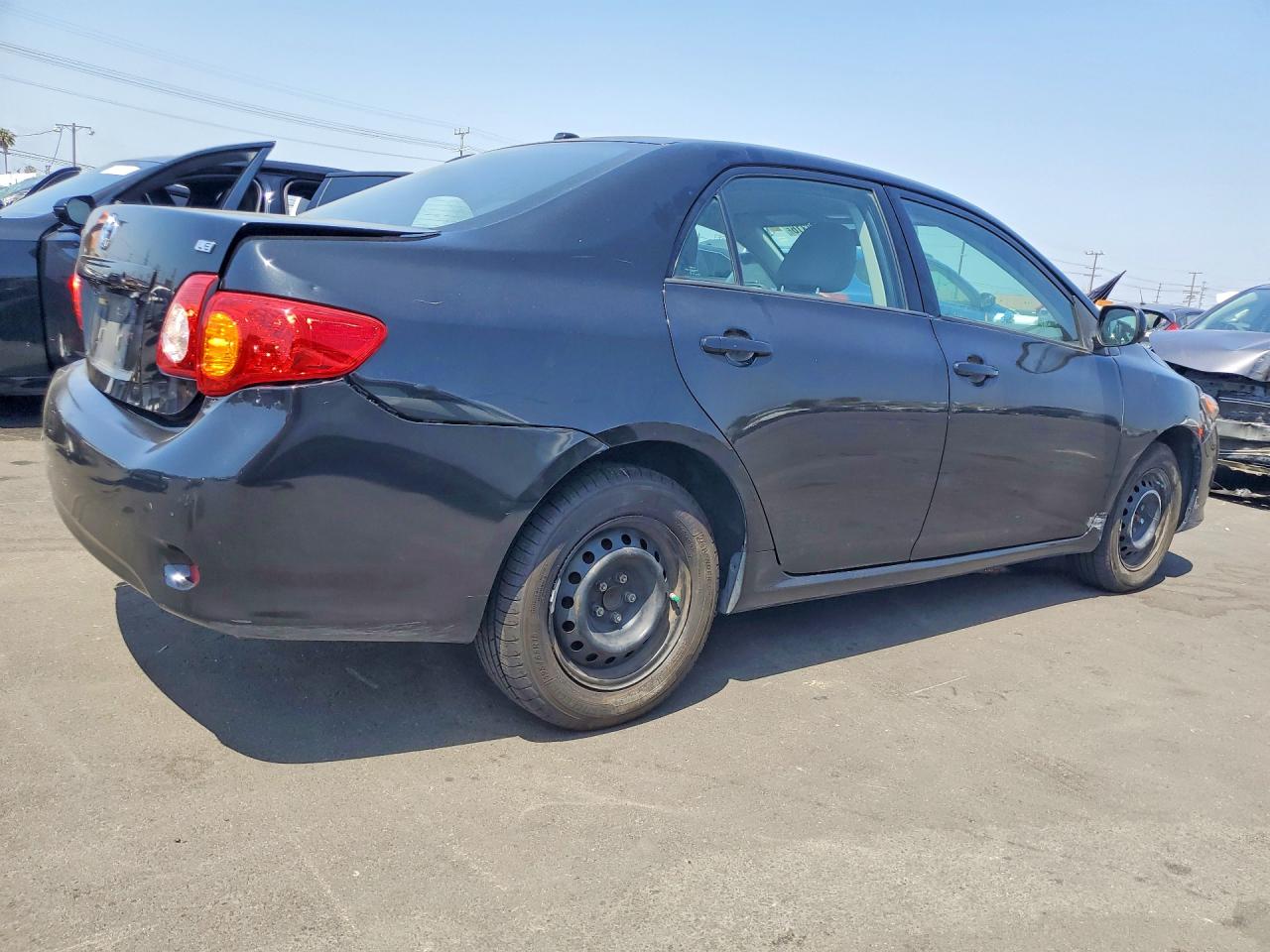 2010 Toyota Corolla Le Black vin: 2T1BU4EE7AC510152