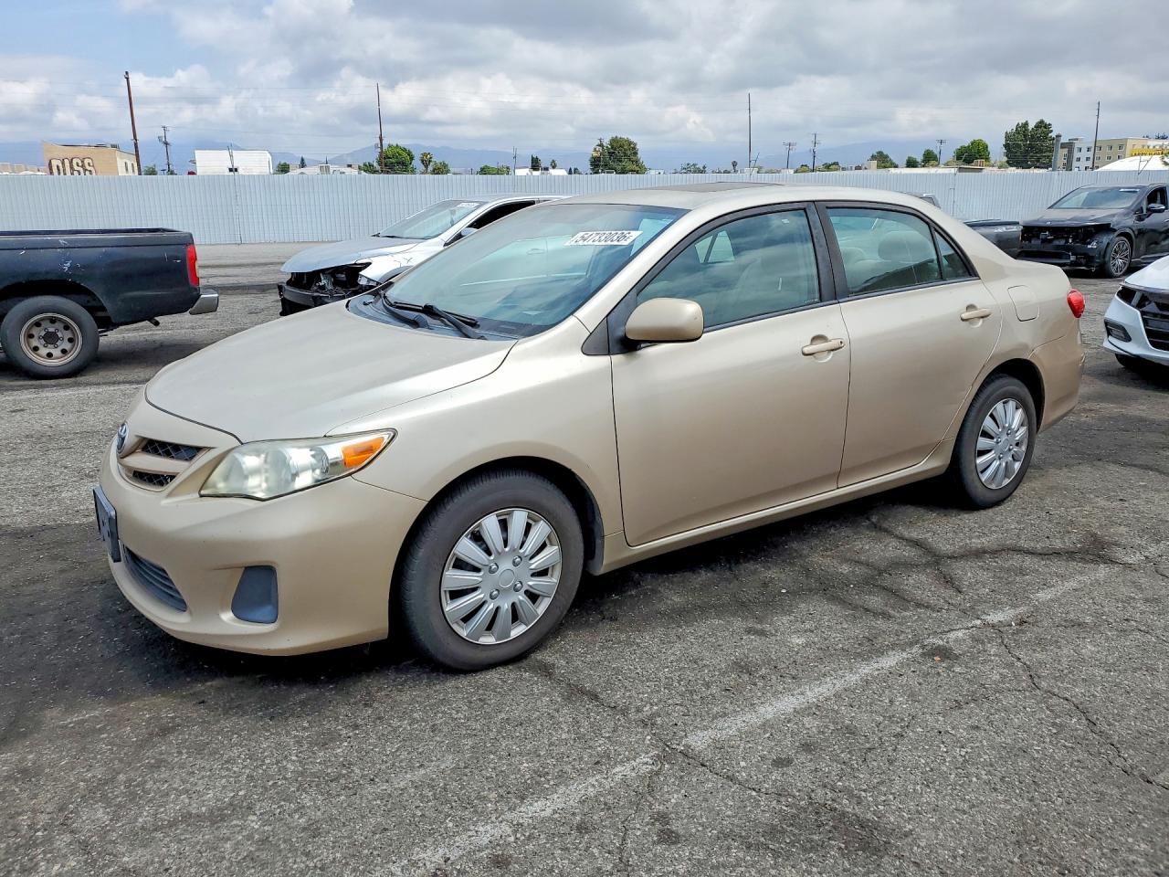 2011 Toyota Corolla Le Gold vin: 2T1BU4EE7BC599657