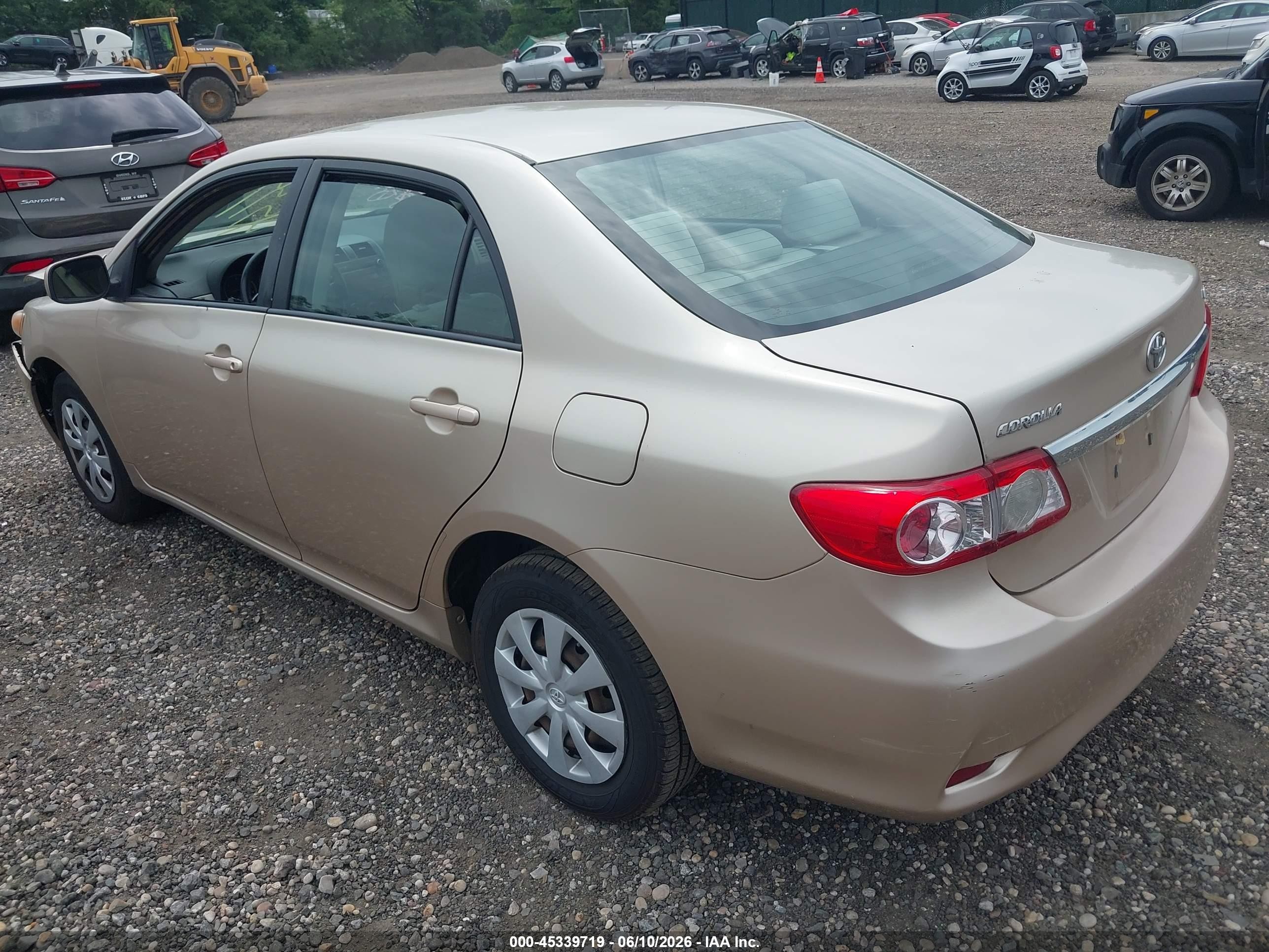 2011 Toyota Corolla Le Gold vin: 2T1BU4EE7BC707856