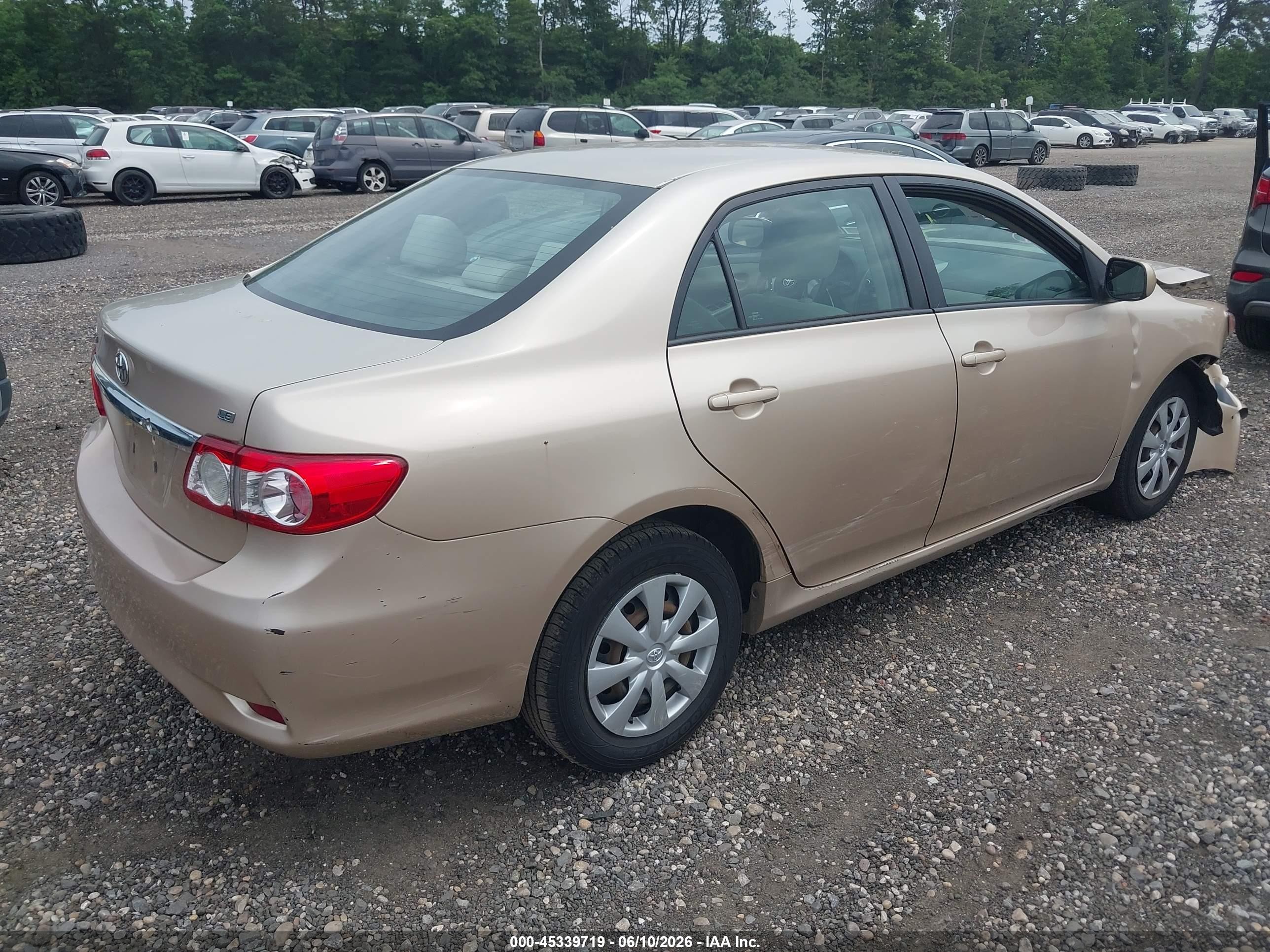 2011 Toyota Corolla Le Gold vin: 2T1BU4EE7BC707856