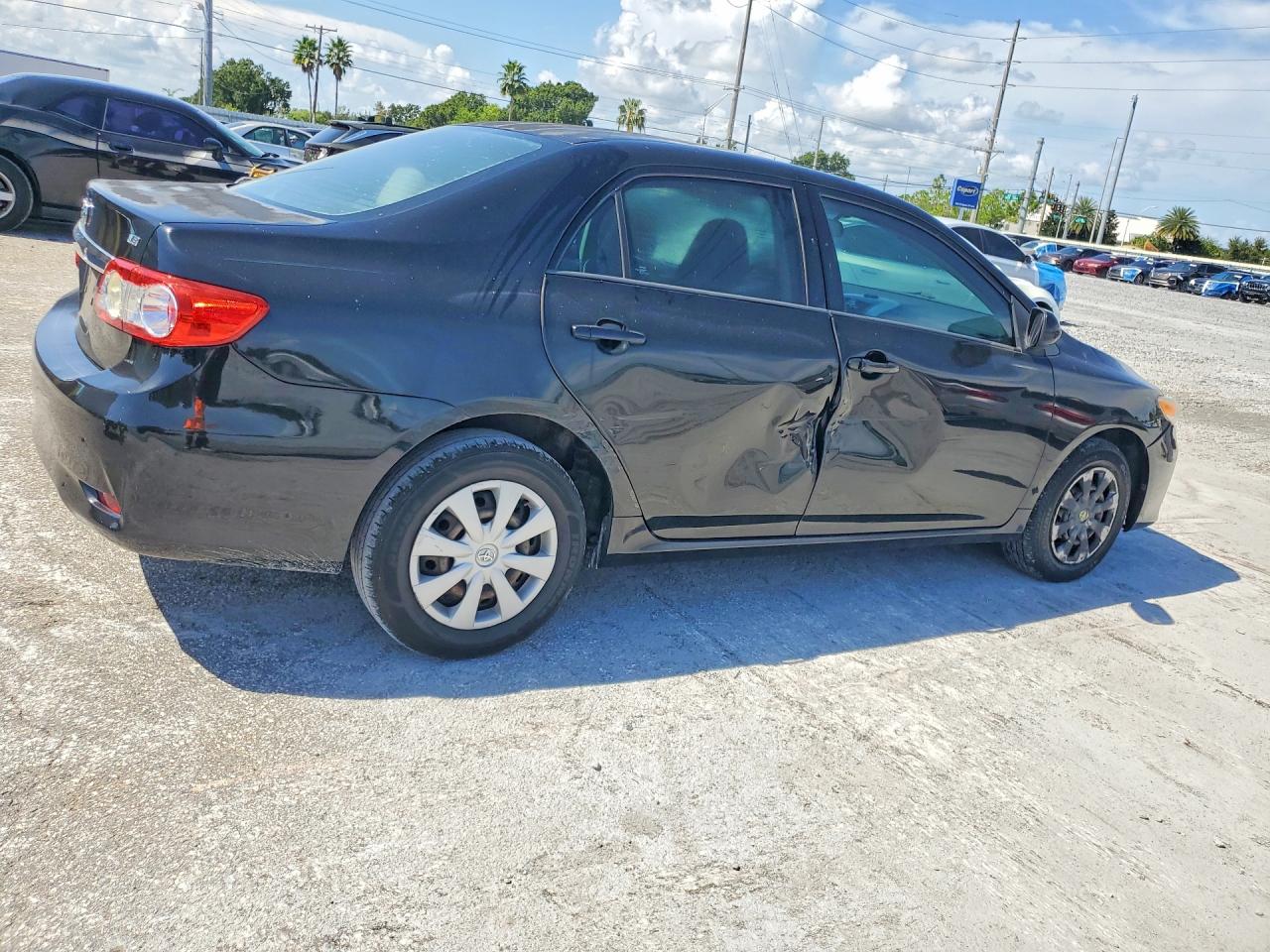 2011 Toyota Corolla Le Black vin: 2T1BU4EE7BC711776