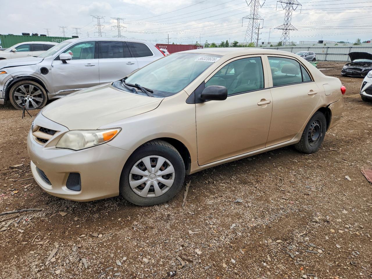 2011 Toyota Corolla Base Tan vin: 2T1BU4EE7BC727038