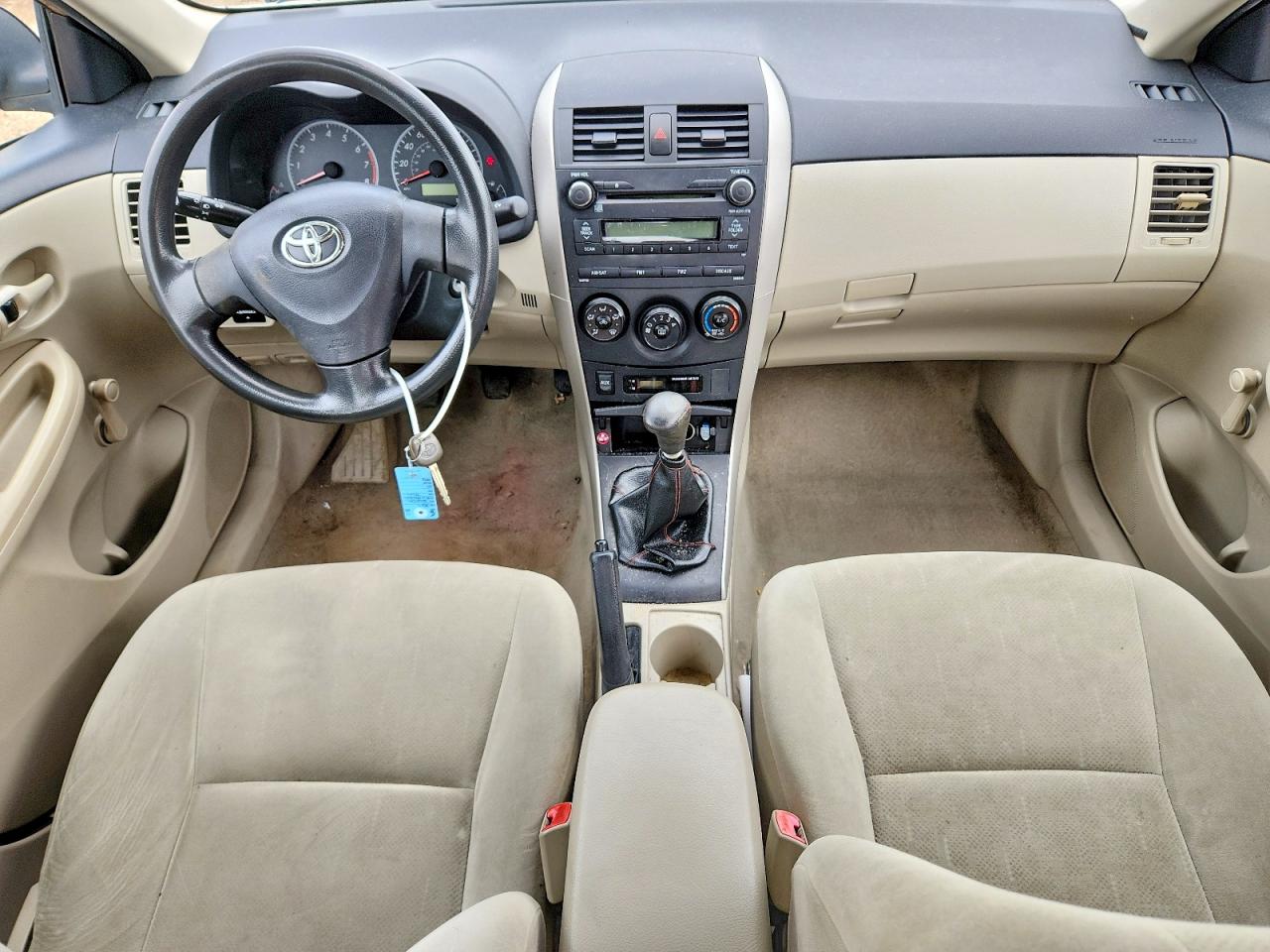 2011 Toyota Corolla Base Tan vin: 2T1BU4EE7BC727038