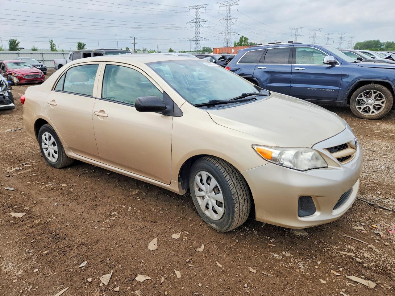 2011 Toyota Corolla Base Tan vin: 2T1BU4EE7BC727038