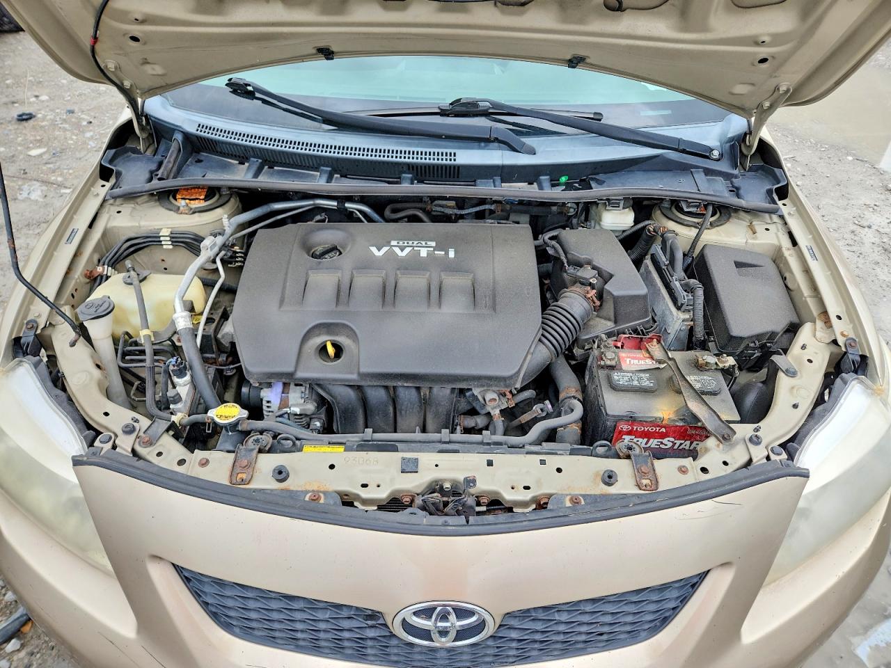 2010 Toyota Corolla Le Gold vin: 2T1BU4EE8AC320859