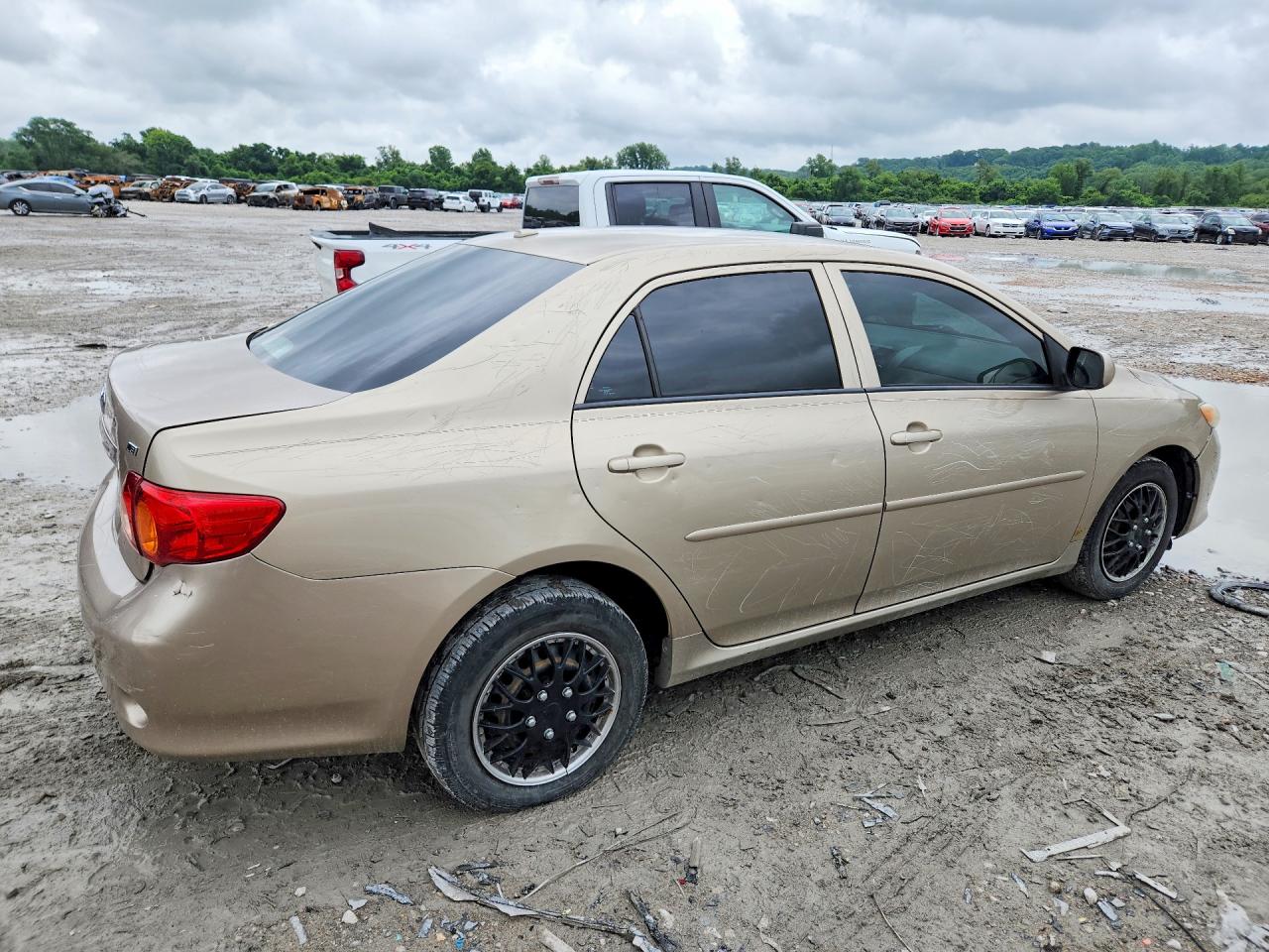 2010 Toyota Corolla Le Gold vin: 2T1BU4EE8AC320859