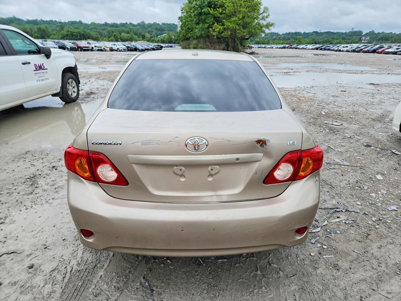2010 Toyota Corolla Le Gold vin: 2T1BU4EE8AC320859