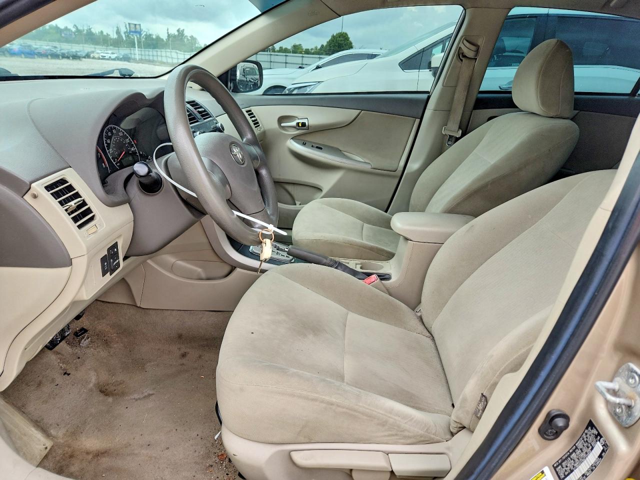 2010 Toyota Corolla Le Gold vin: 2T1BU4EE8AC320859