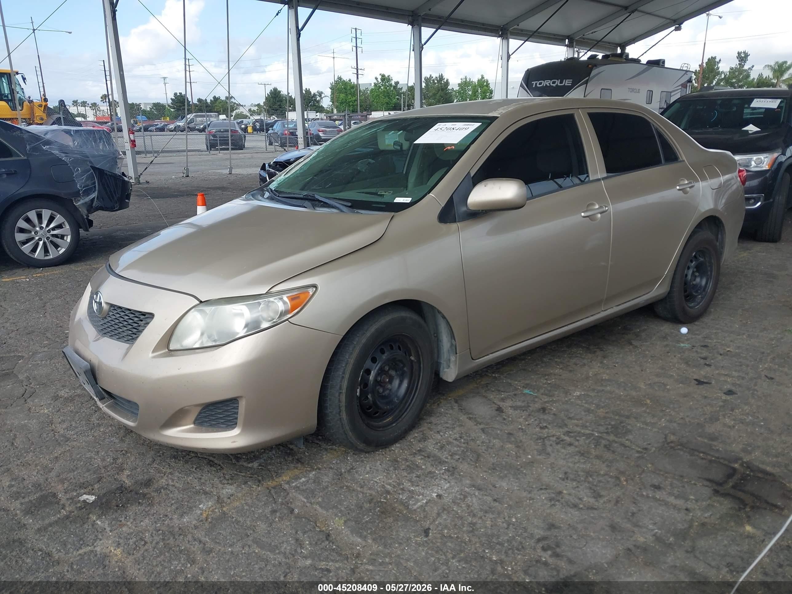 2010 Toyota Corolla Le Gold vin: 2T1BU4EE8AC436045