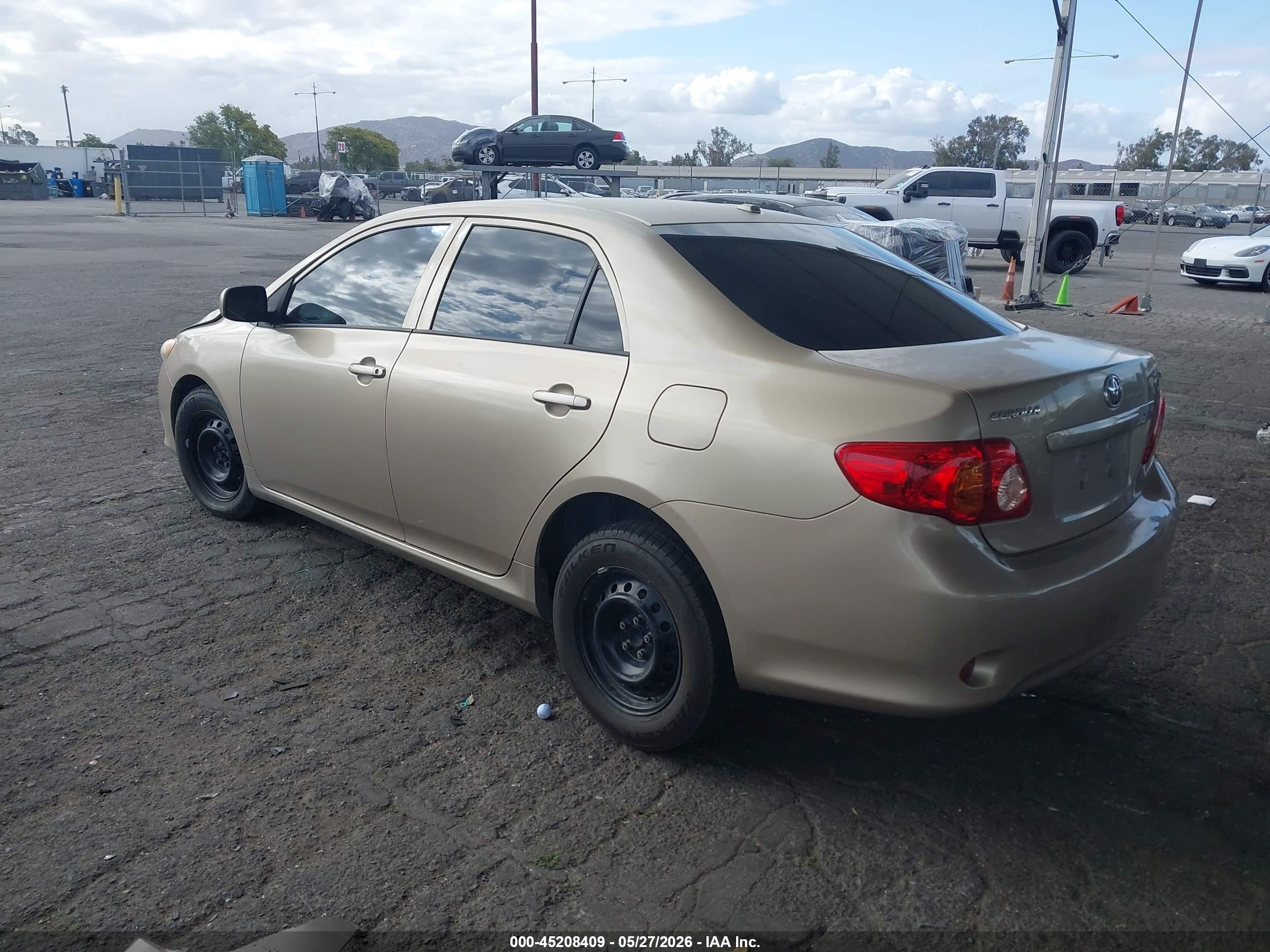 2010 Toyota Corolla Le Gold vin: 2T1BU4EE8AC436045