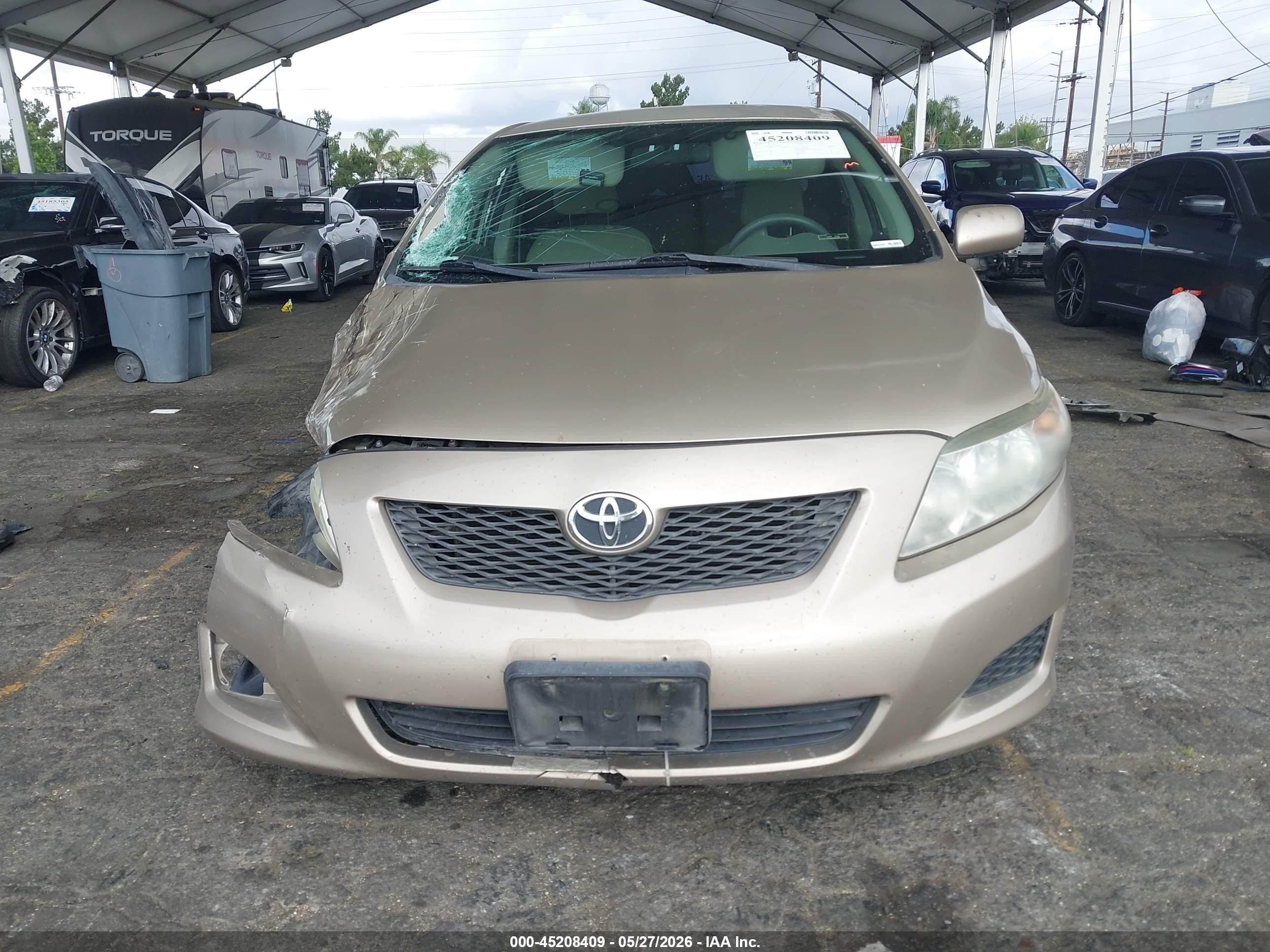 2010 Toyota Corolla Le Gold vin: 2T1BU4EE8AC436045