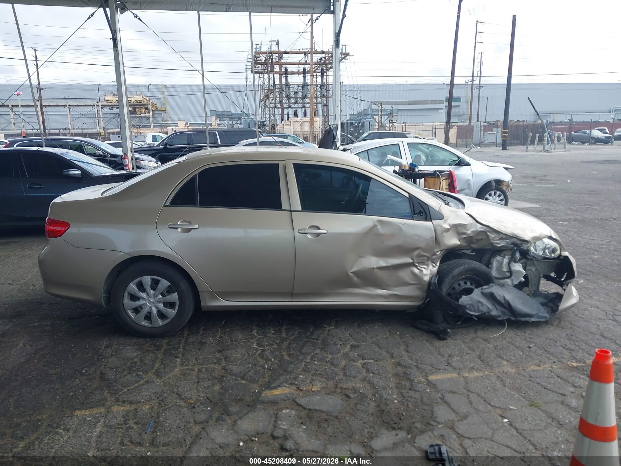 2010 Toyota Corolla Le Gold vin: 2T1BU4EE8AC436045