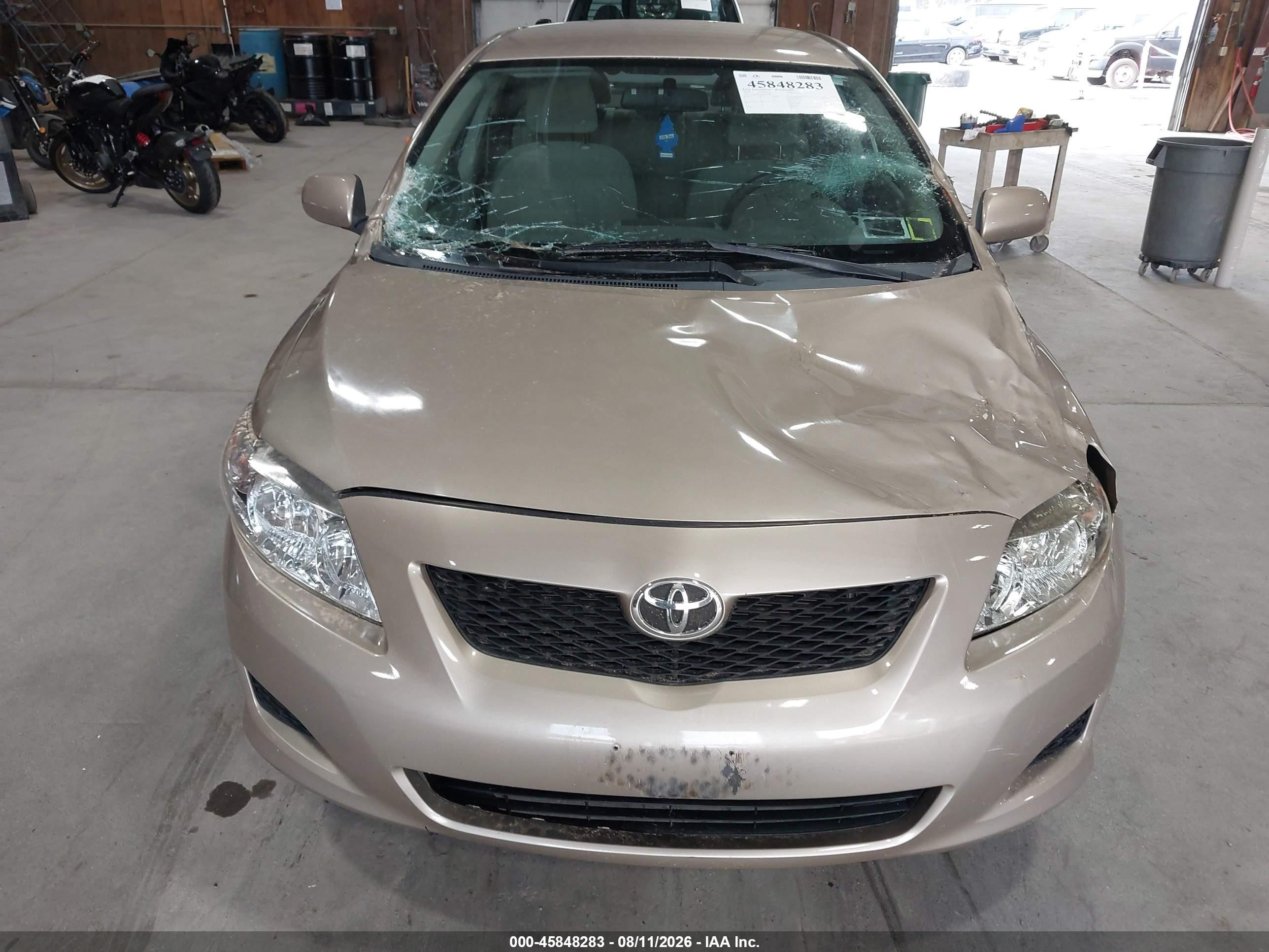 2010 Toyota Corolla Le Tan vin: 2T1BU4EE8AC499887