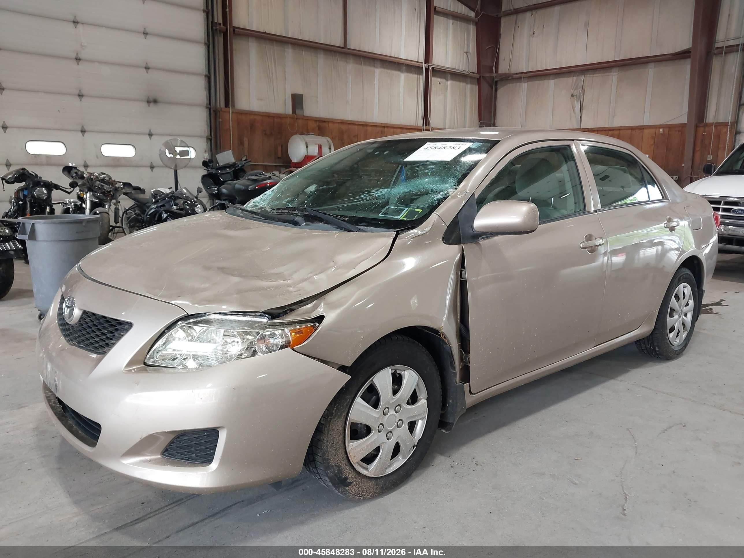 2010 Toyota Corolla Le Tan vin: 2T1BU4EE8AC499887