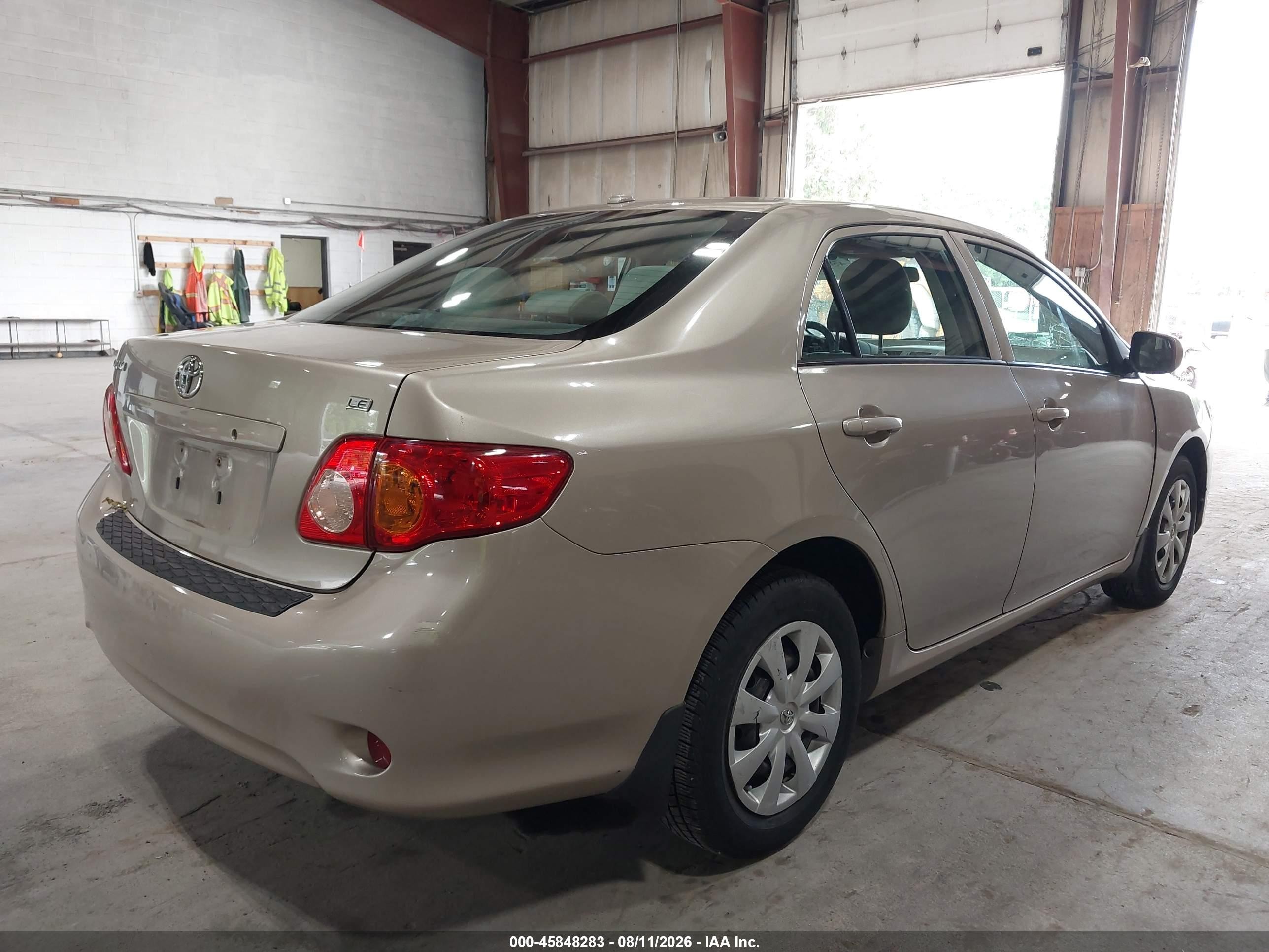2010 Toyota Corolla Le Tan vin: 2T1BU4EE8AC499887