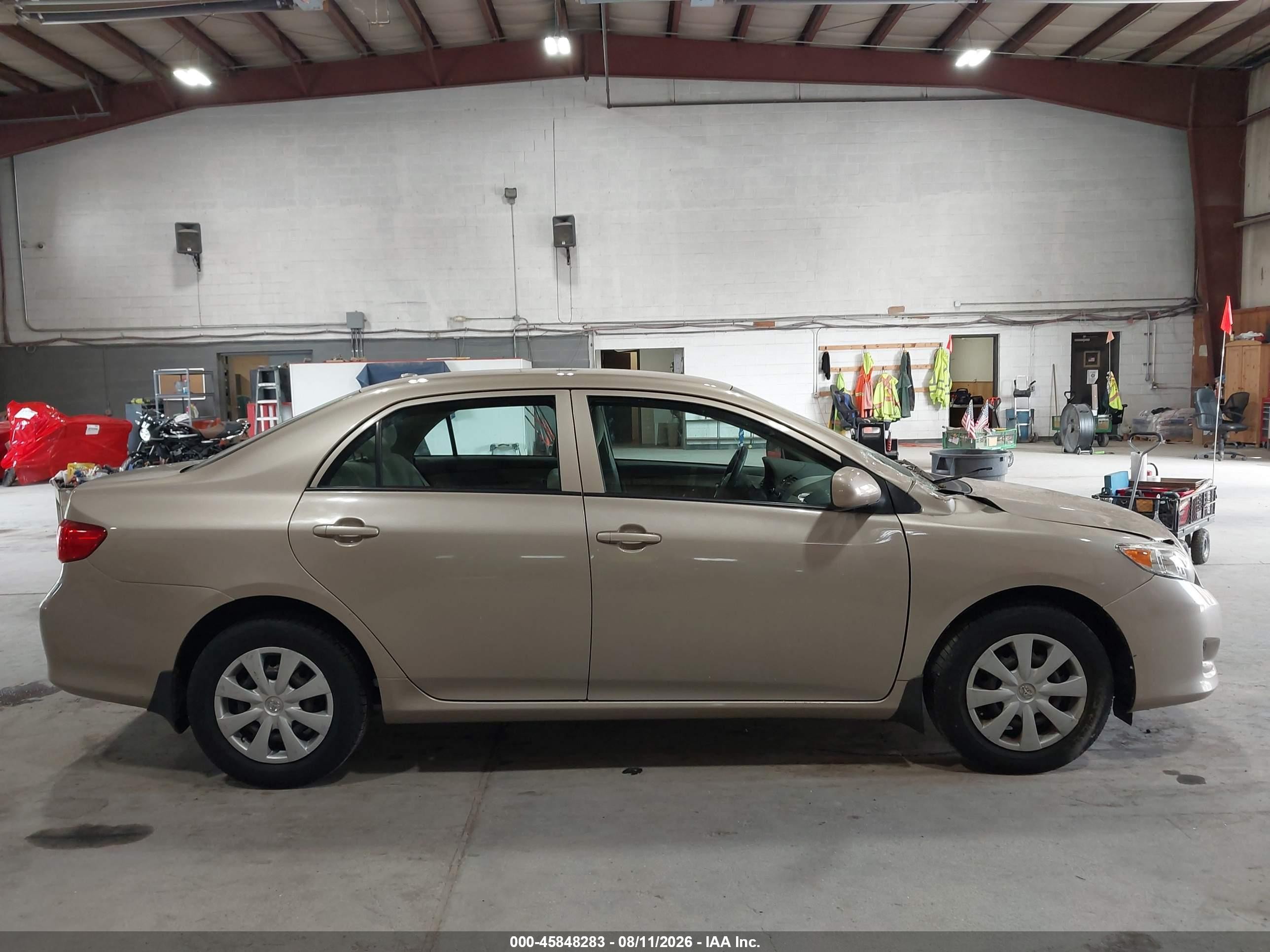 2010 Toyota Corolla Le Tan vin: 2T1BU4EE8AC499887