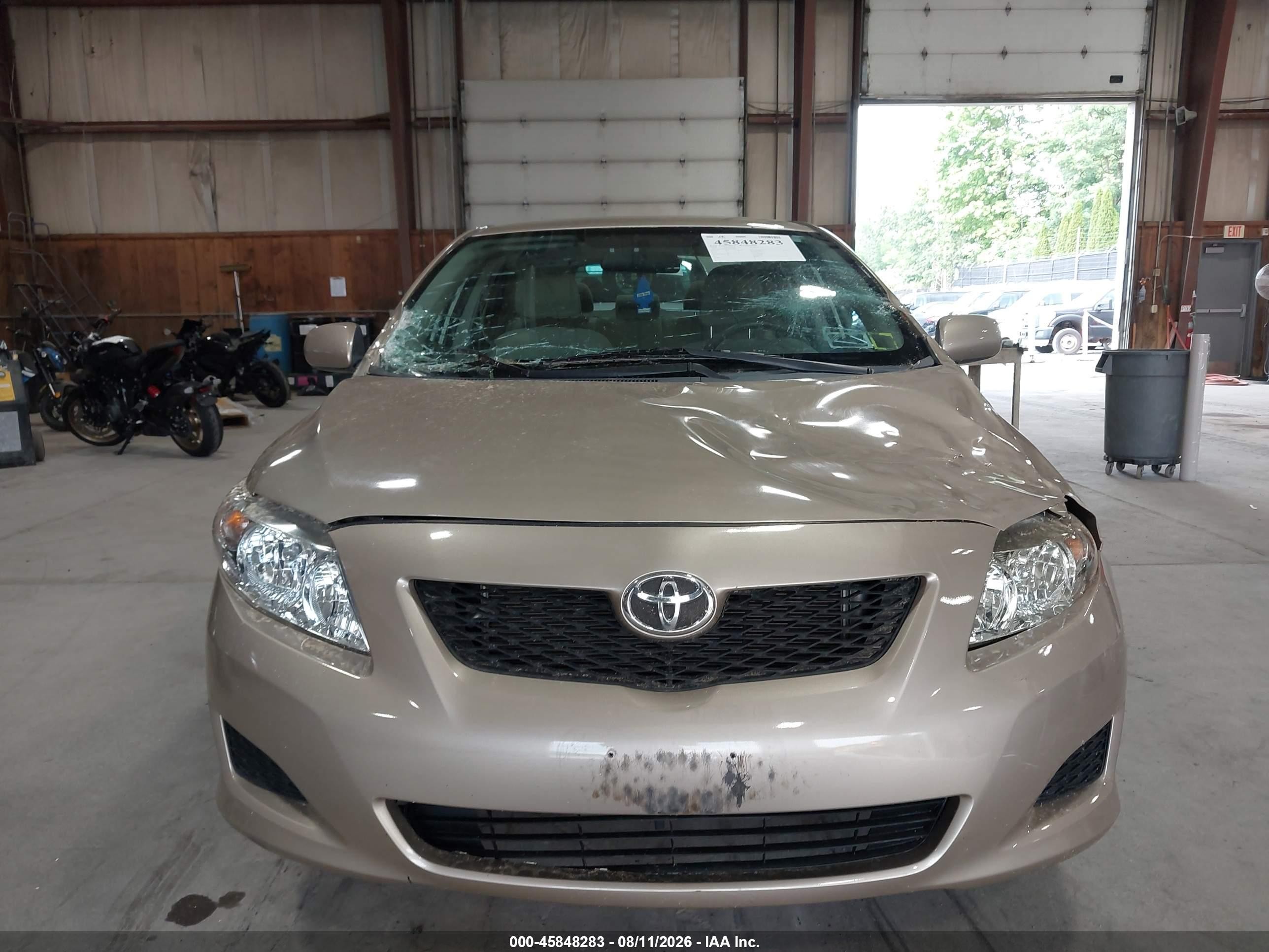 2010 Toyota Corolla Le Tan vin: 2T1BU4EE8AC499887